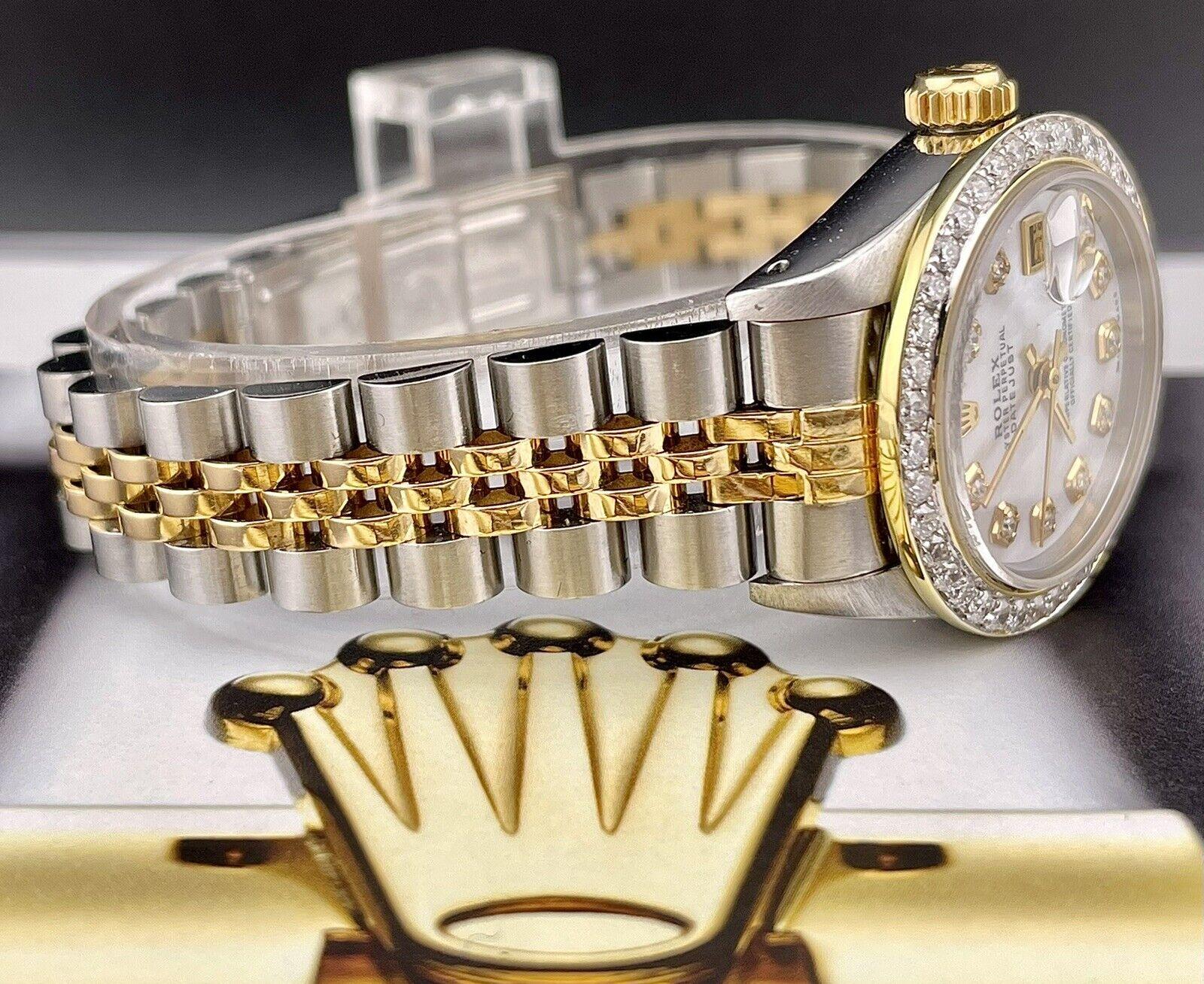 Montre Rolex Datejust 26mm. Une montre d'occasion avec boîte cadeau. La montre est 100% authentique et est accompagnée d'une carte d'authenticité. La référence de la montre est 69173 et elle est en excellent état (voir photos). Le cadran est en