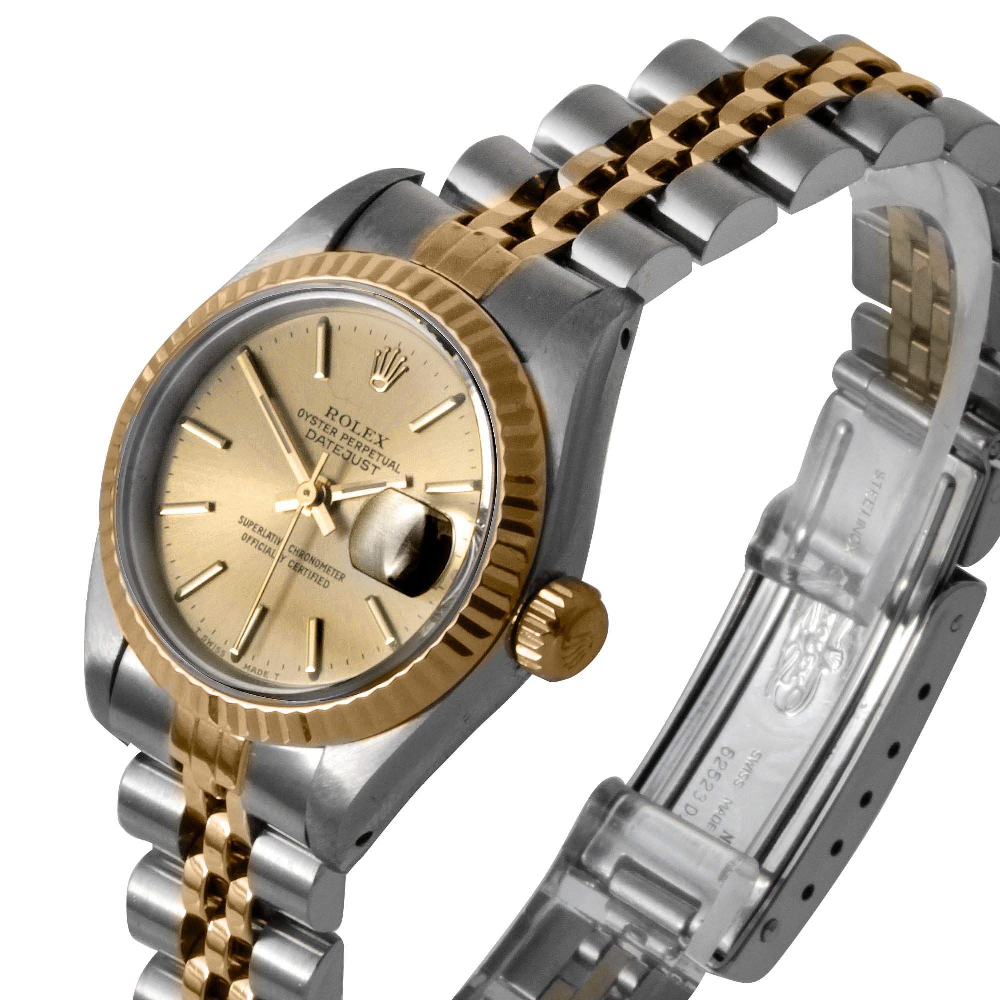 (Watch Description)
Brand - Rolex
Gender - Ladies
Model - 6917 Datejust
Metals - Stainless Steel
Case size - 26mm
Bezel - Yellow gold fluted.
Crystal - Acrylic
Movement - Mechanical Cal.2030
Dial - Champagne Stick
Wrist band - Rolex two tone