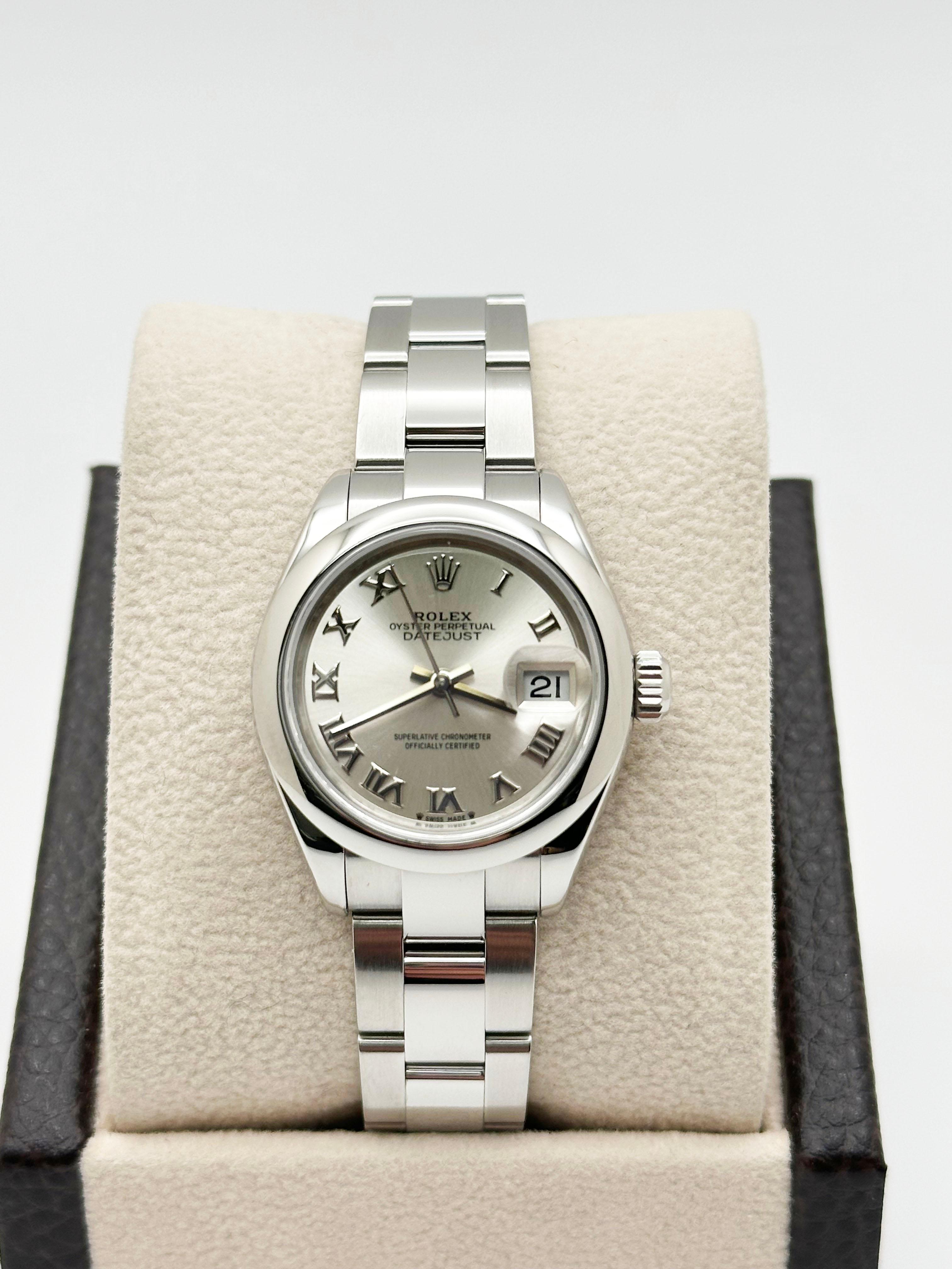 Style Number: 279160



Serial: 15T08***



Year: 2019

  

Model: Rolex Ladies Datejust 

 

Case Material: Stainless Steel 

 

Band: Stainless Steel 

  

Bezel: Stainless Steel Smooth Bezel 

  

Dial: Silver Roman Dial 

 

Face: Sapphire