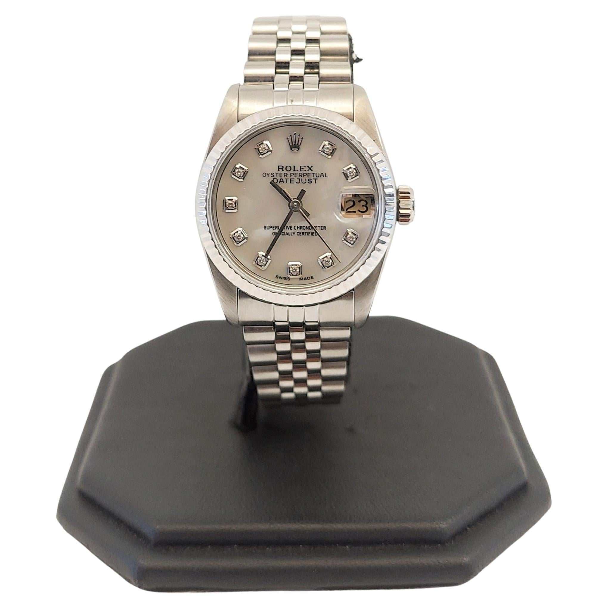 Vintage Rolex Datejust, Black Diamond Dial, 18 Karat Bezel on Jubilee