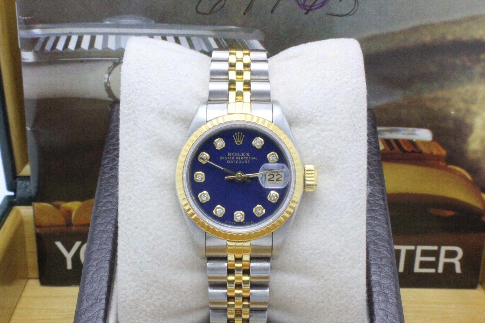 Style Number: 69163

 

Serial: 863****

 

Model: Datejust

 

Case: Stainless Steel

 

Band: 18K Yellow Gold & Stainless Steel

 

Bezel: 18K Yellow Gold Fluted Bezel

 

Dial: Custom Diamond Dial

 

Face: Sapphire Crystal

 

Case Size: 26mm

