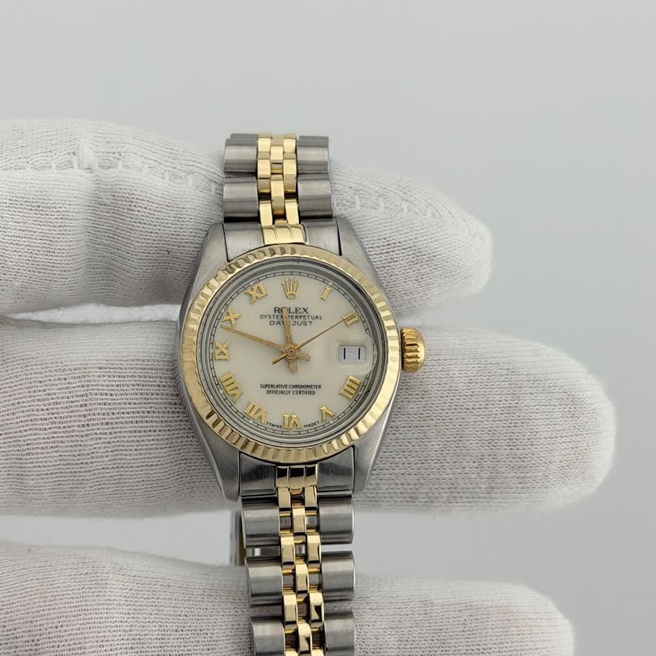 Style Number: 6917



Serial: 596****



Year: 1979

 

Model: Rolex Ladies Datejust

 

Case Material: Stainless Steel 

 

Band: 14k Yellow Gold 
Stainless Steel Jubilee

  

Bezel: 14k Yellow Gold Fluted

  

Dial: Cream Roman Numeral Dial

