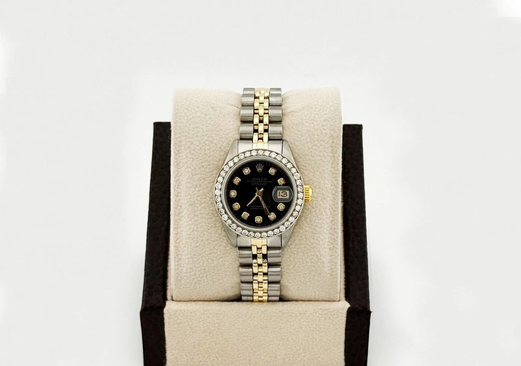 Style Number: 6917



Serial: 6980***



Year: 1981

 

Model: Rolex Ladies Datejust 

 

Case Material: Stainless Steel 

 

Band: 14K Yellow Gold & Stainless Steel Jubilee Band 

  

Bezel: Custom Diamond Bezel 

  

Dial: Custom Black Diamond