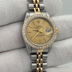 Rolex Ladies Datejust 69173 26mm Champagne Dial Diamond Bezel 18k Gold Steel