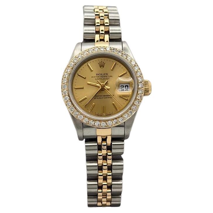 Rolex Ladies Datejust 69173 26mm Champagne Dial Diamond Bezel 18k Gold Steel