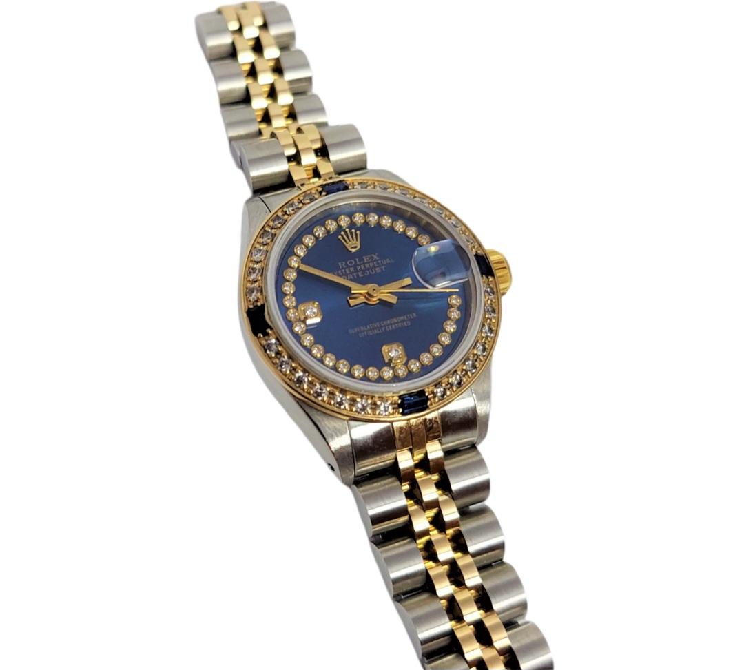 (Watch Description)
Brand - Rolex
Gender - Ladies
Model - 69173 Datejust
Metals - Stainless Steel/Yellow gold
Case size - 26mm
Bezel - Yellow Gold sapphire Diamond
Crystal - Sapphire
Movement - Mechanical Cal.2035
Dial - Refinished blue String