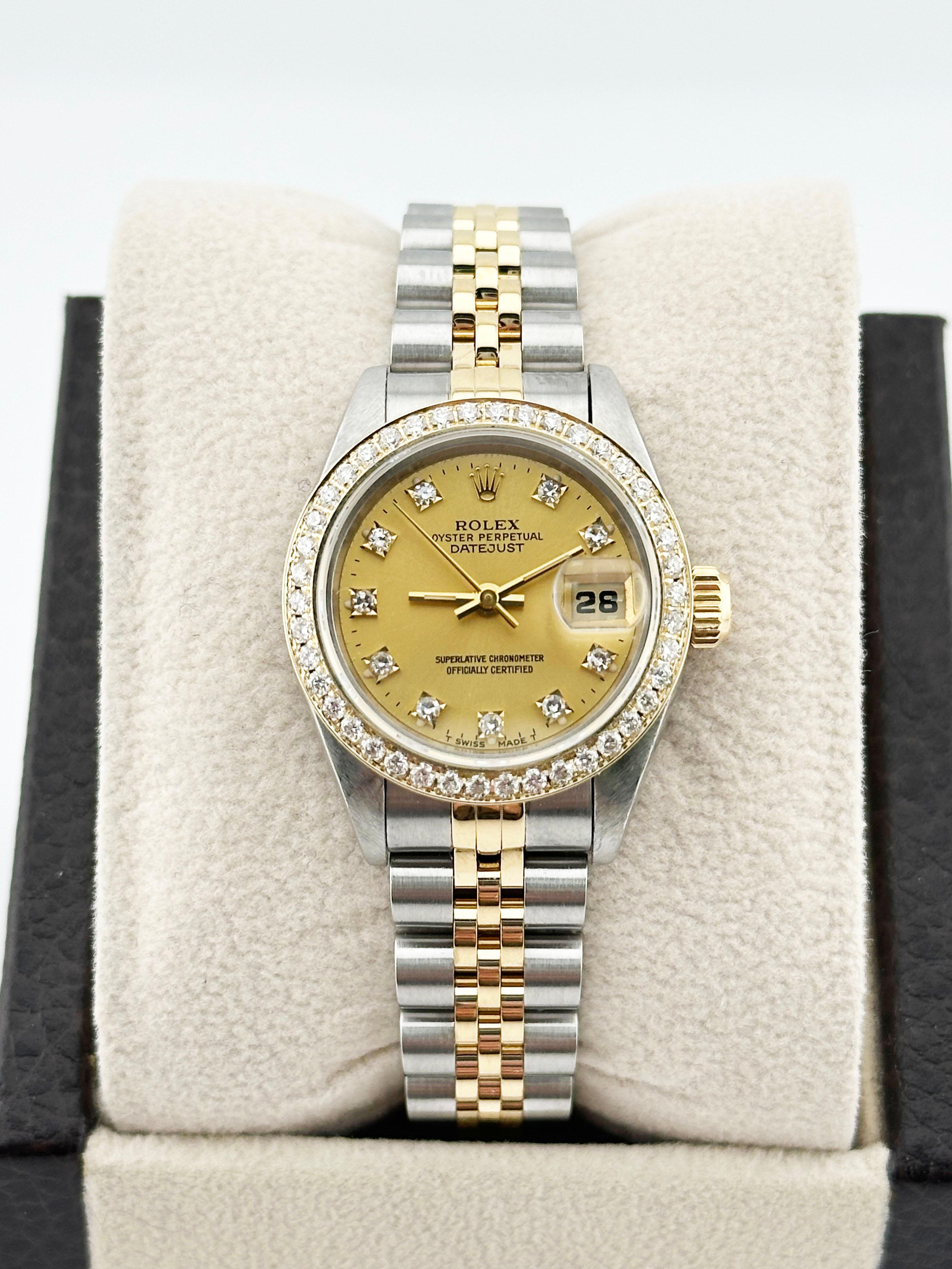 Style Number: 69173



Serial: S397***



Year: 1993

 

Model: Rolex Ladies Datejust

 

Case Material: Stainless Steel 

 

Band: 18K Yellow Gold & Stainless Steel 

  

Bezel: Custom Diamond Bezel 

  

Dial: Original Diamond Dial 

 

Face: