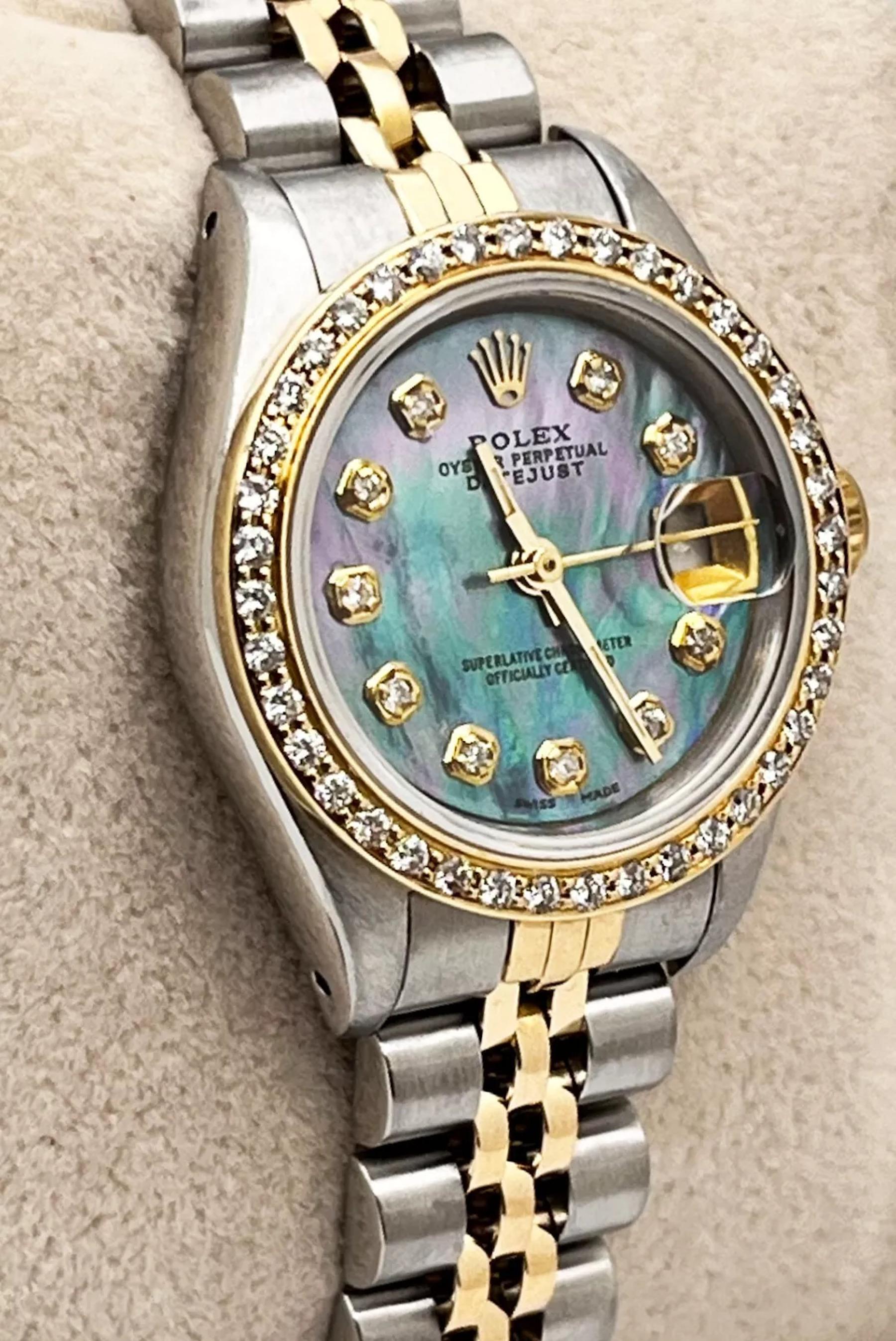 Número de estilo: 69173
De serie: N192***
Año: 1991
Model No: Ladies Datejust
Material de la caja: Acero inoxidable
Pulsera: Oro amarillo de 18 quilates y acero inoxidable
Bisel: Bisel de diamantes personalizado
Esfera: Esfera personalizada de