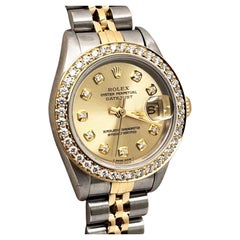 Rolex Montre Datejust 69173 pour femmes avec cadran en diamants et lunette en or jaune 18 carats et acier