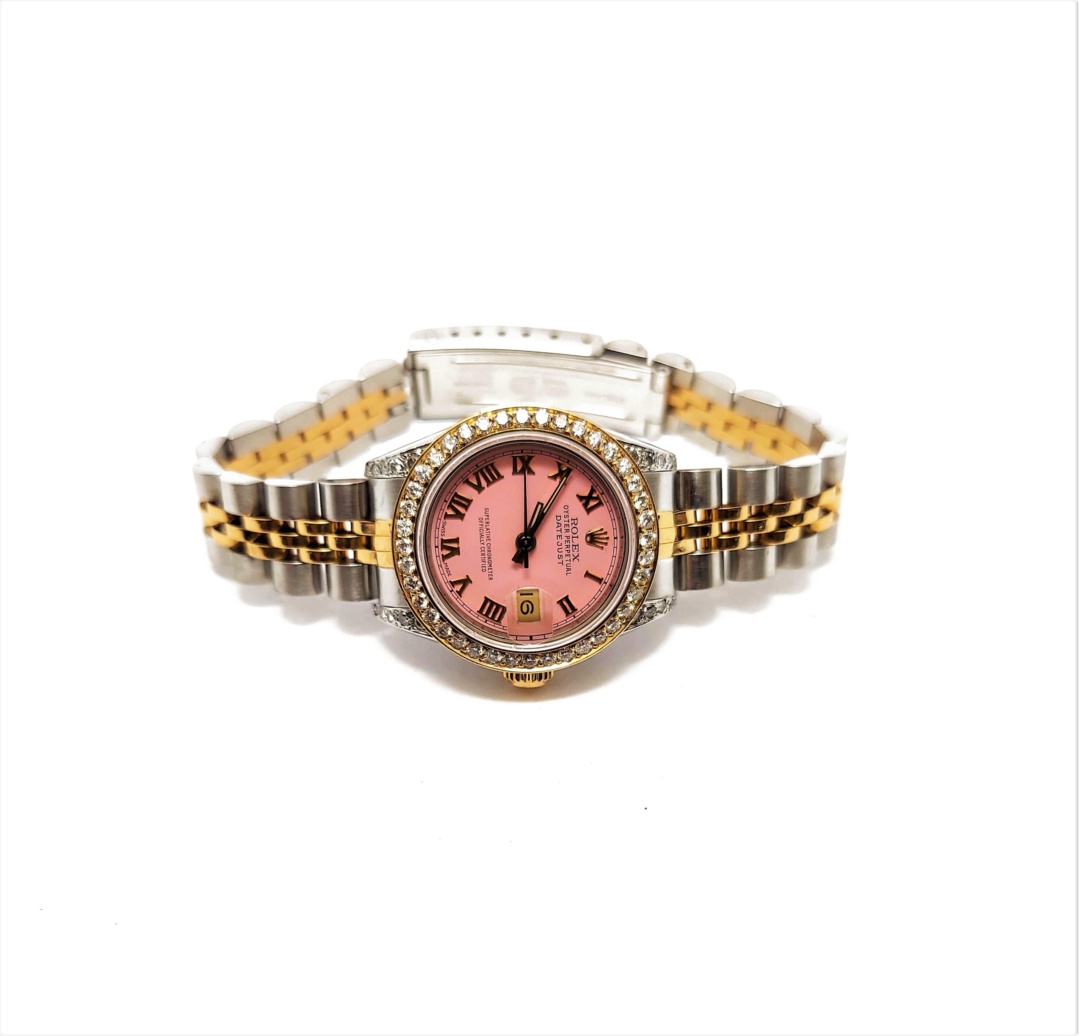 Brand - Rolex
Gender - Ladies
Condition - Pre owned
Model - 69173 datejust
Metals - solid gold & stainless steel
Case size - 26mm
Bezel - yellow gold diamond
Crystal - sapphire
Movement - automatic caliber 2135
Dial - refinished pink roman