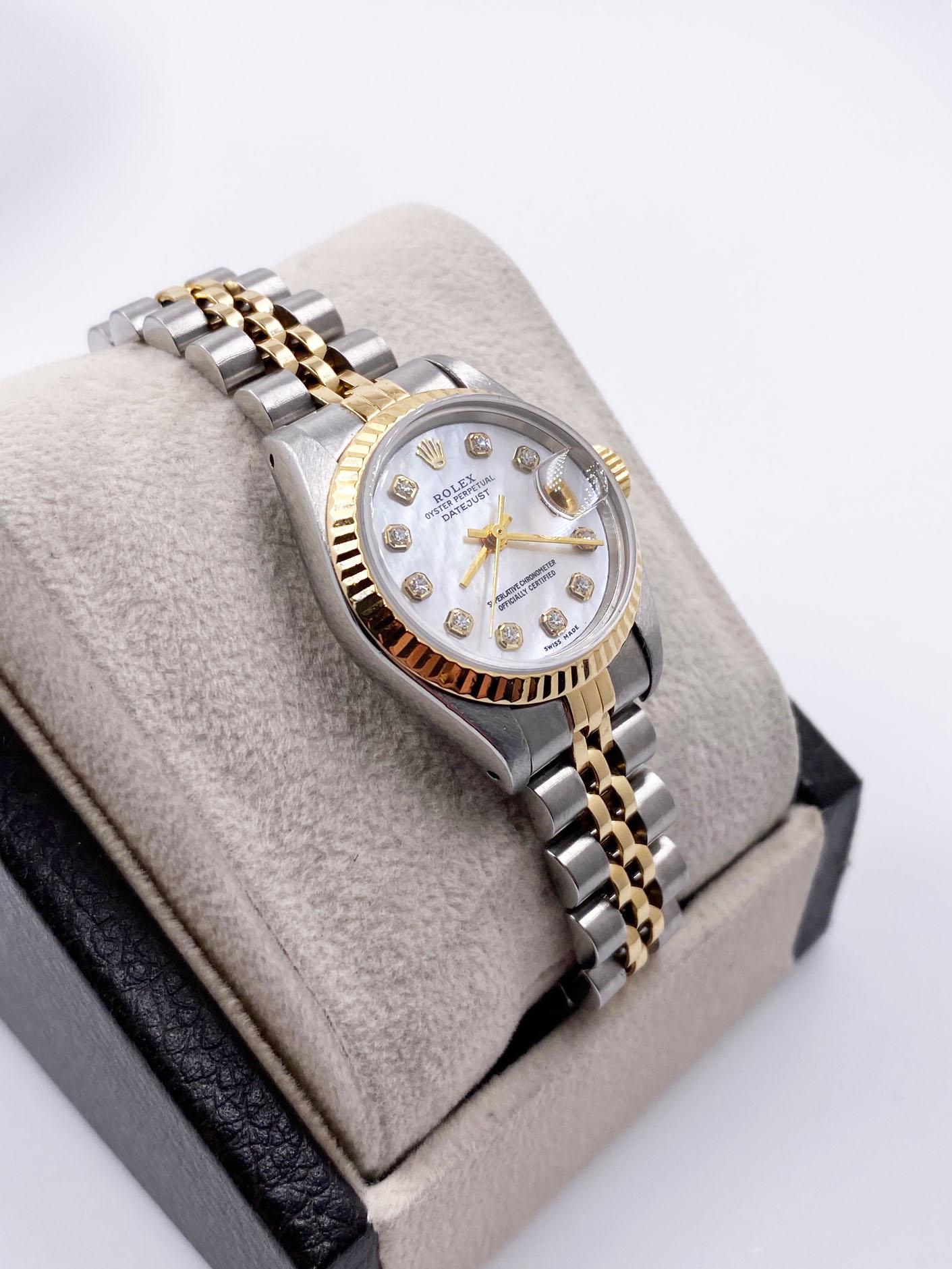 Style Number: 69173

 

Serial: S228***

 

Model: Datejust 

 

Case Material: Stainless Steel

 

Band: 18K Yellow Gold & Stainless Steel

 

Bezel:  18K Yellow Gold

 

Dial: Custom MOP Diamond Dial 

 

Face: Sapphire Crystal 

 

Case Size: