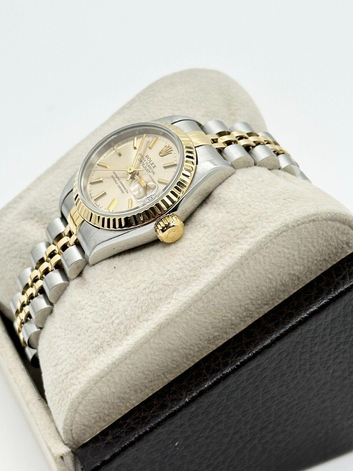 Style Number: 69173



Serial: W121***



Year: 1995

 

Model: Ladies Datejust

 

Case Material: Stainless Steel

 

Band: 18K Yellow Gold & Stainless Steel

 

Bezel: 18K Yellow Gold

 

Dial: Silver

 

Face: Sapphire Crystal

 

Case Size: