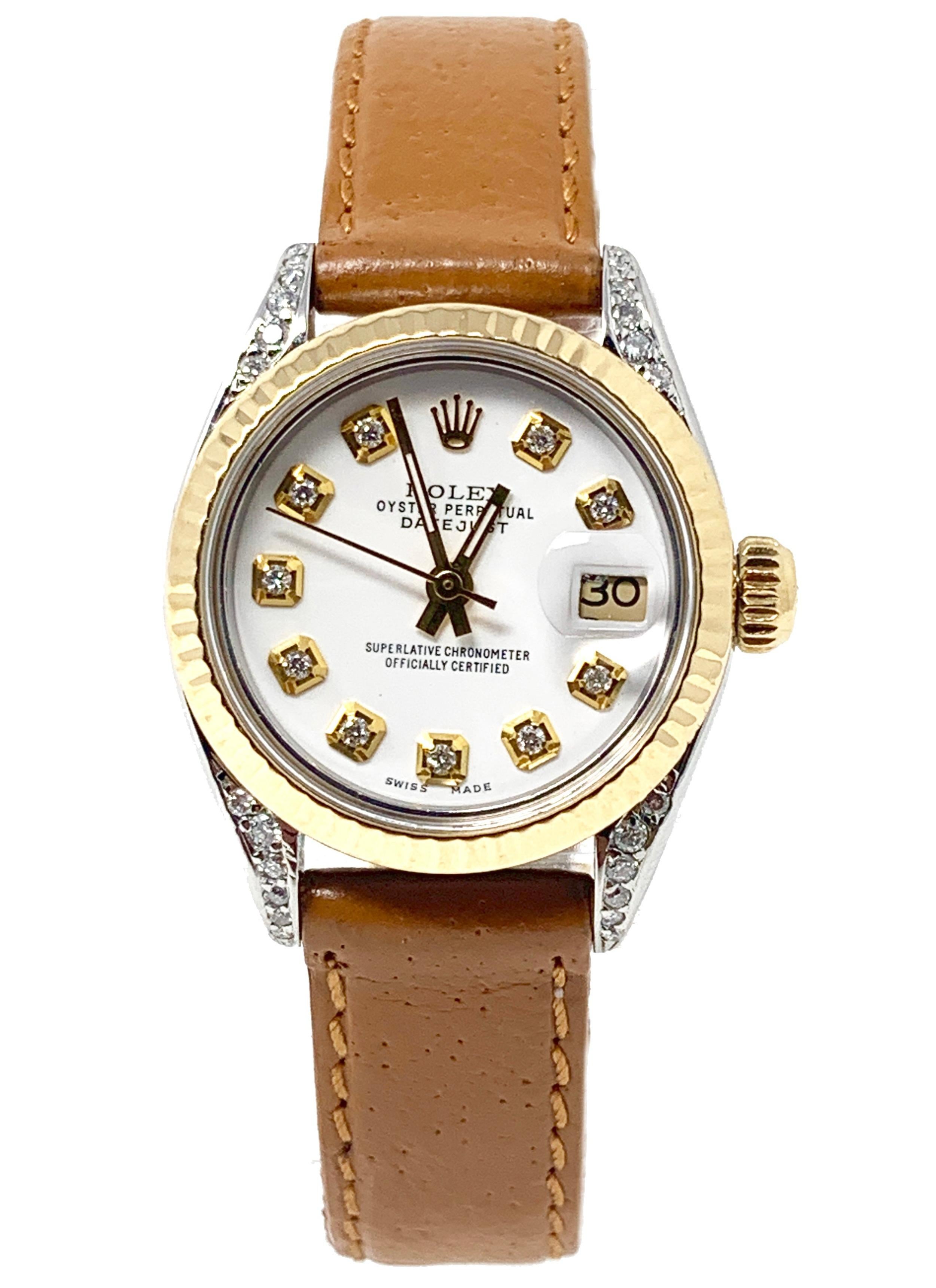 (Watch Description)
Brand - Rolex
Gender - Ladies
Model - 69173 Datejust 
Metals - Yellow gold/Stainless steel 
Case size - 26mm
Bezel - Yellow Gold fluted
Crystal - Sapphire
Movement - Automatic Cal.2135
Dial - Refinished white diamond 
Wrist band