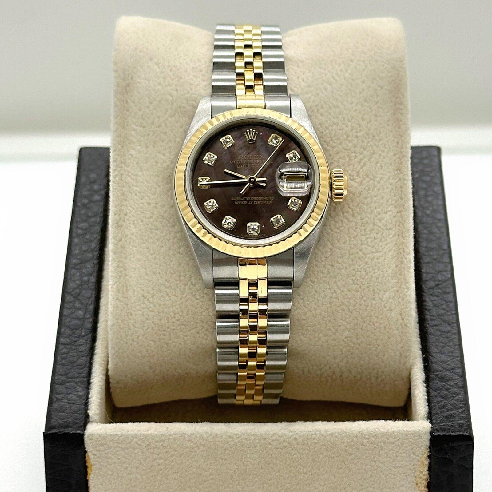 Style Number: 79173

Serial: A834217

Year: 2000

Model: Ladies Datejust

Case Material: Stainless Steel

Band: 18K Yellow Gold and Stainless Steel

Bezel: 18K Yellow Gold 

Dial: Original Factory Tahitian MOP Diamond Dial

Face: Sapphire