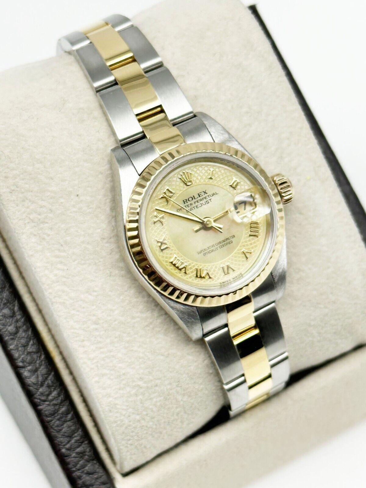 Rolex Ladies Datejust 79173 MOP Roman Dial 18K Yellow Gold Box Paper 2002 In Excellent Condition For Sale In San Diego, CA