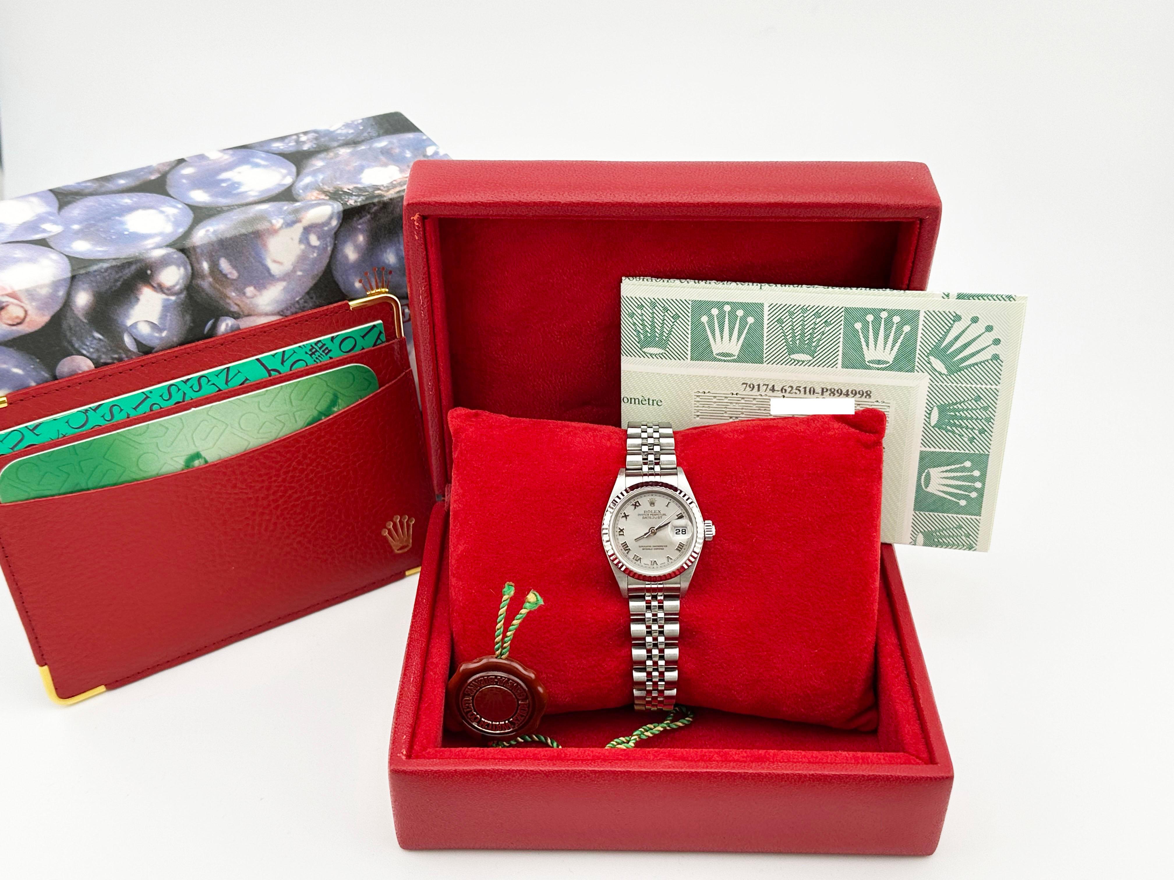 Style Number: 79174



Serial: P894***



Year: 2001

 

Model: Rolex Ladies Datejust 

 

Case Material: Stainless Steel 

 

Band: Stainless Steel 

 

Bezel: 18K White Gold Fluted Bezel 

 

Dial: Silver Roman Dial 

 

Face: Sapphire Crystal 

