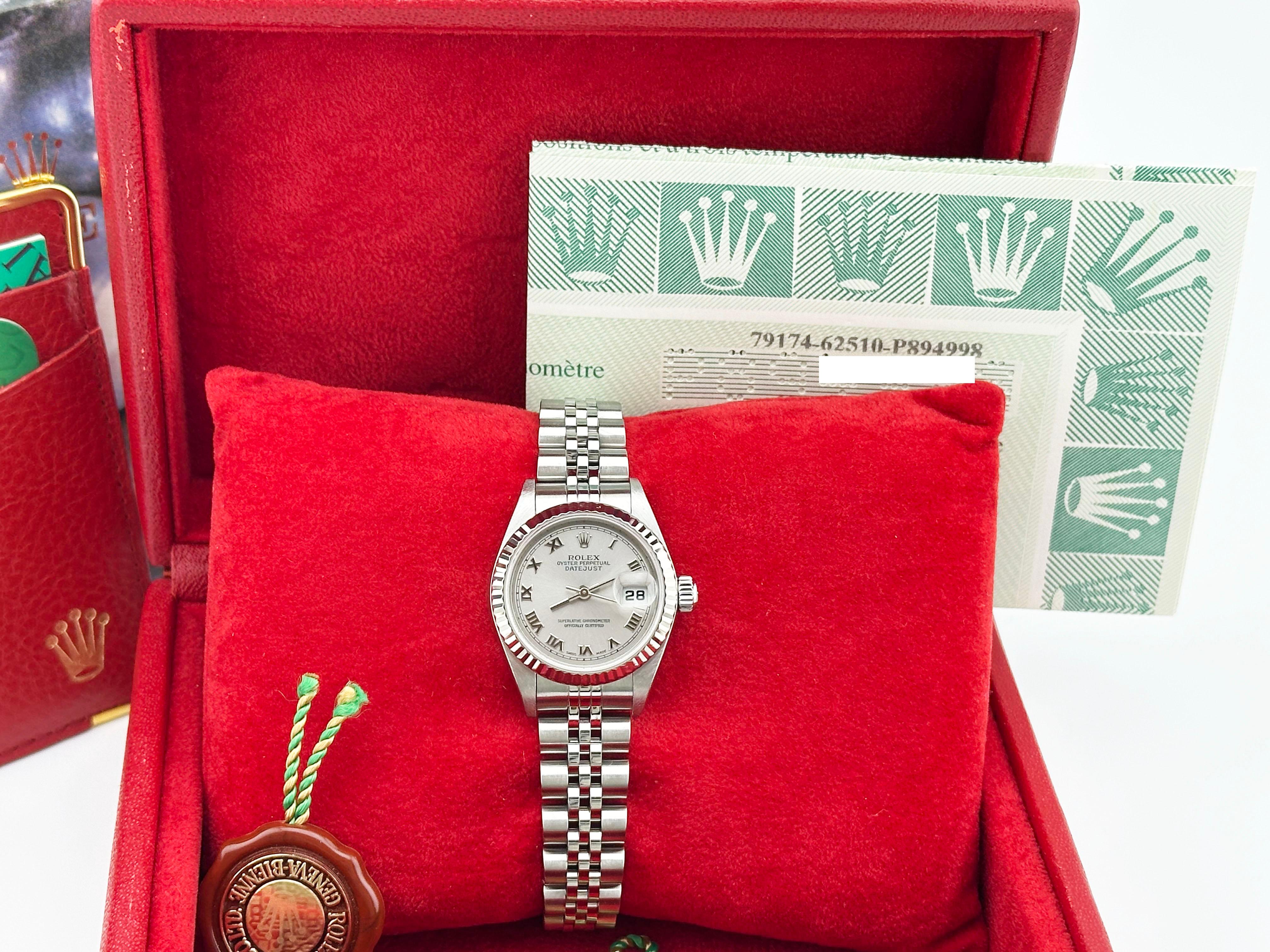 Rolex Ladies Datejust 79174 Silver Roman Dial Stainless Steel Box Paper In Excellent Condition For Sale In San Diego, CA