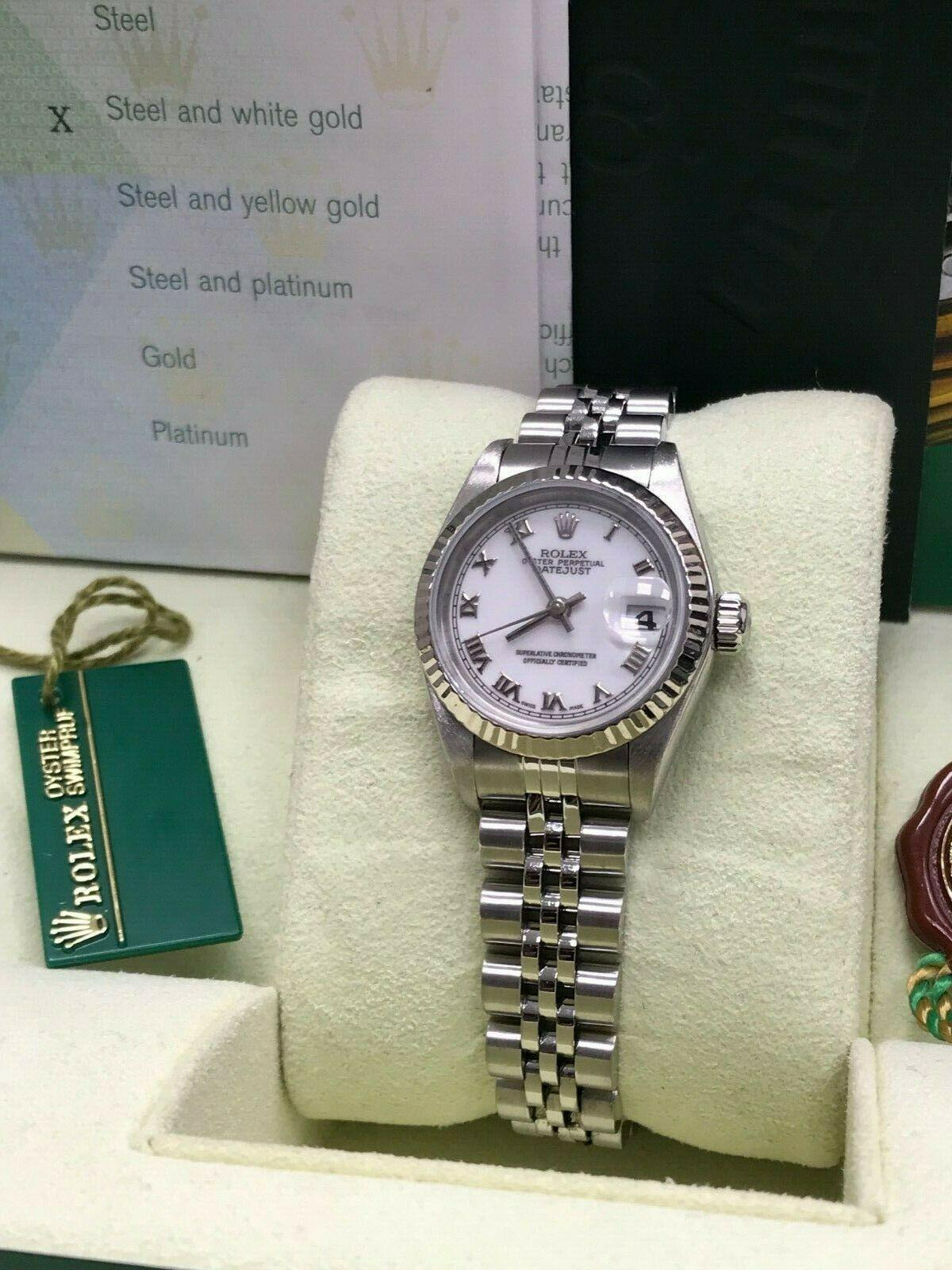 Style Number: 79174

 

Serial: F117***



Year: 2004

 

Model: Datejust

 

Case Material: Stainless Steel

 

Band: Stainless Steel

 

Bezel:  18K White Gold

 

Dial: White

 

Face: Sapphire Crystal

 

Case Size: 26mm

 

Includes: 

-Rolex