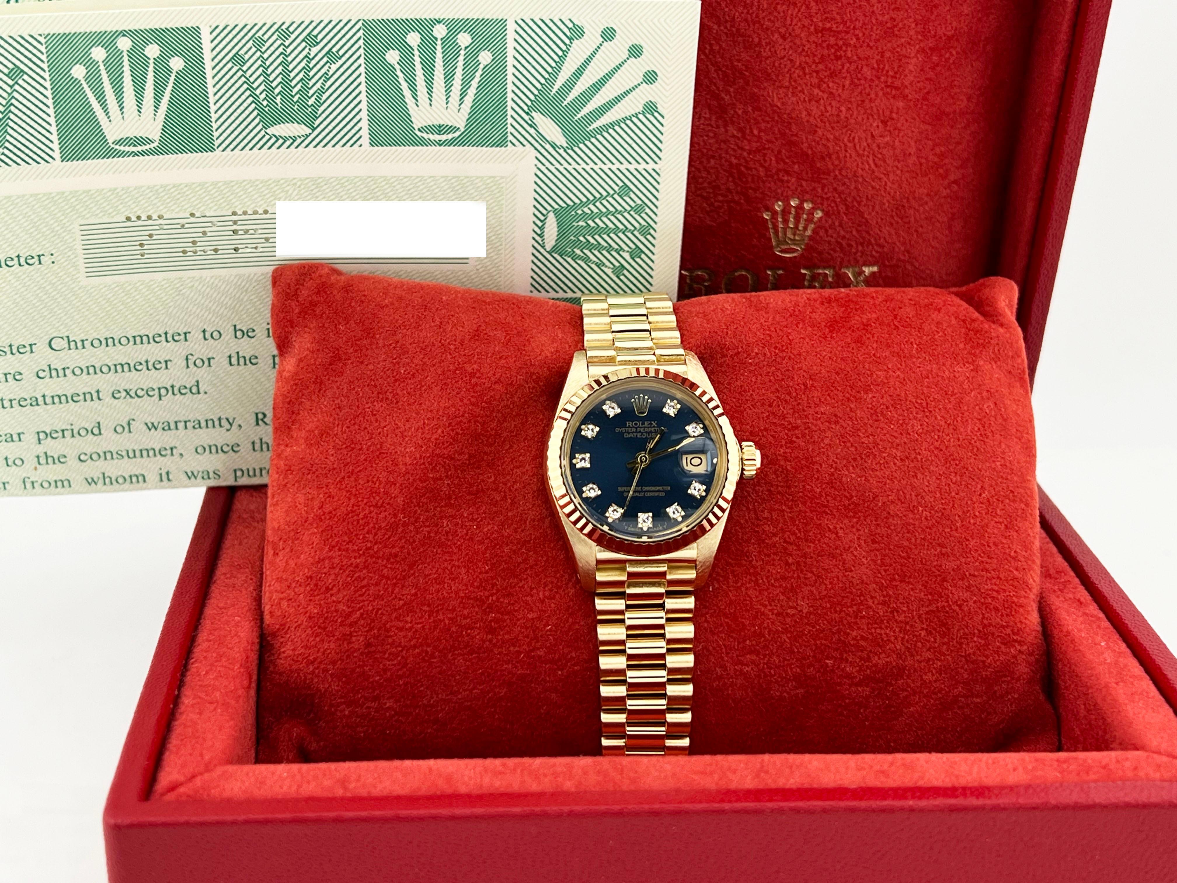 Style Number: 6917



Serial: 7253***



Year: 1982

 

Model: Rolex Ladies Datejust President 

 

Case Material: 18K Yellow Gold 

 

Band: 18K Yellow Gold 

  

Bezel: 18K Yellow Gold 

  

Dial: Factory Original Blue Diamond Dial 

 

Face: