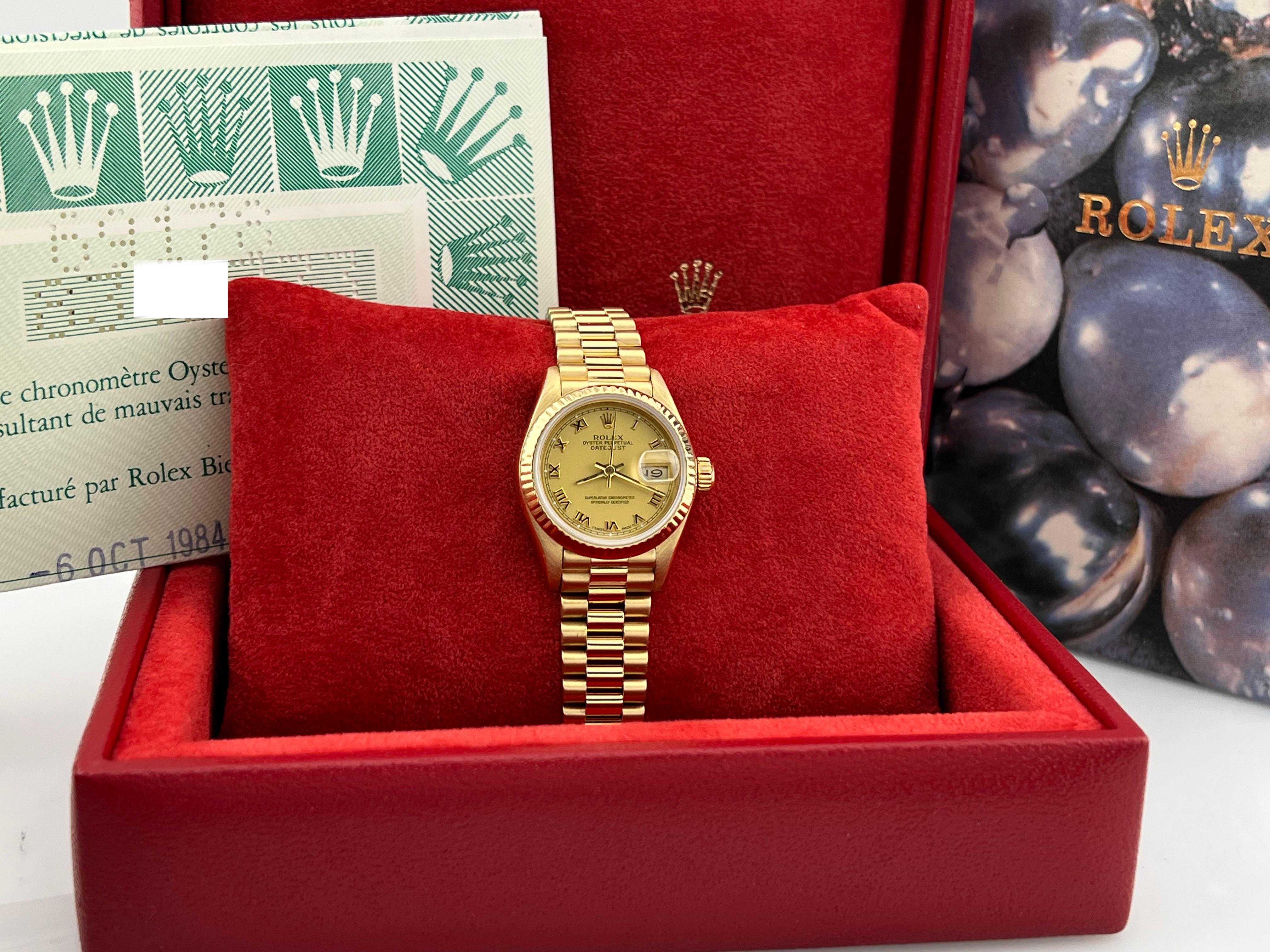 Style Number: 69178

Year: 1984

Model: Rolex Ladies Datejust President

Case Material: 18K Yellow Gold

Band: 18K Yellow Gold President Bracelet

Bezel: 18K Yellow Gold

Dial: Champagne

Face: Sapphire Crystal

Case Size: 26mm

Includes: 

-Rolex