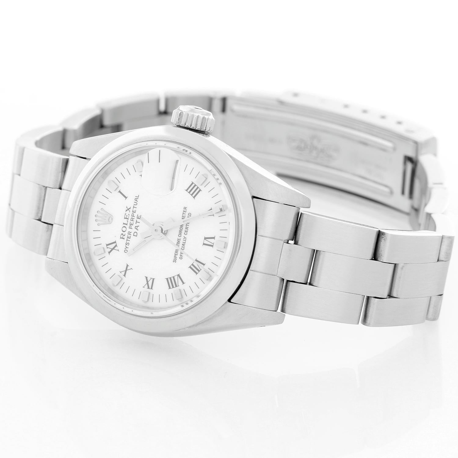 Rolex Ladies Datejust Stainless Steel  Watch - Automatic winding. Stainless steel case with smooth bezel. White dial with Roman numerals. Stainless steel Jubilee bracelet. Pre-owned with custom box .