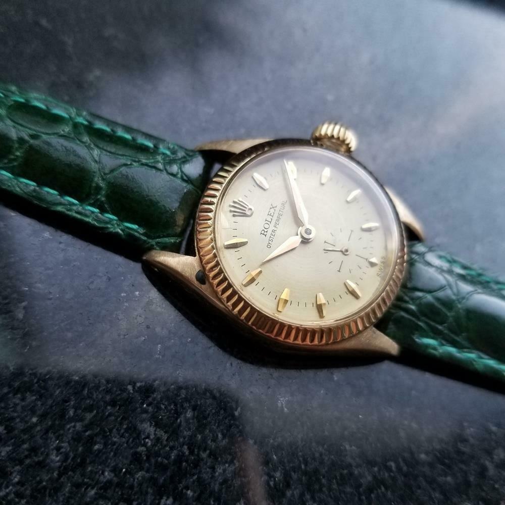 Timeless luxury, ladies solid 18k gold Rolex Oyster Perpetual ref.6509 automatic, c.1950s. Verified authentic by a master watchmaker. Gorgeous gold Rolex signed dial, gold minute and hour hands, subdial second, applied gold diamond shape indice hour