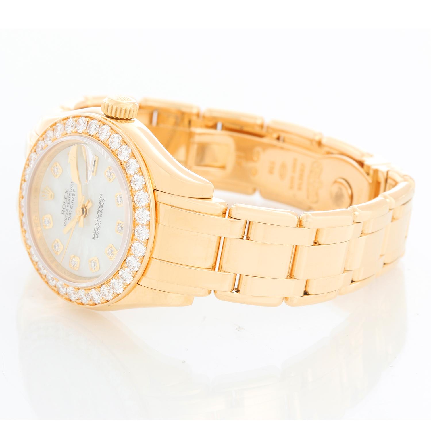 Rolex Ladies Masterpiece/Pearlmaster Gold Diamond Watch 80298 - Automatic winding, 31 jewels, Quickset, sapphire crystal. 18k yellow gold case with full factory diamond bezel. Factory Mother of Pearl dial with diamond hour markers. Pearlmaster