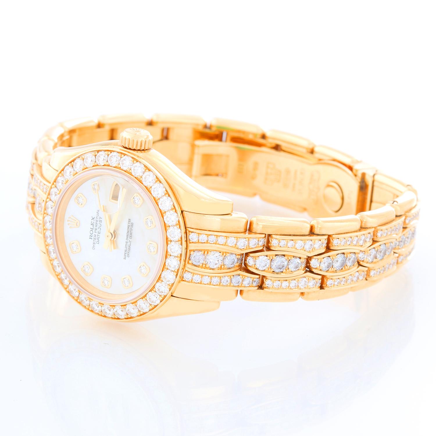 Rolex Ladies Masterpiece/Pearlmaster Gold Mother of Pearl Diamond Watch 80298/ 69298 - Automatic winding, 31 jewels, Quickset, sapphire crystal. 18k yellow gold case with factory 32 diamond bezel (29mm diameter). Genuine Rolex Mother-of-Pearl dial