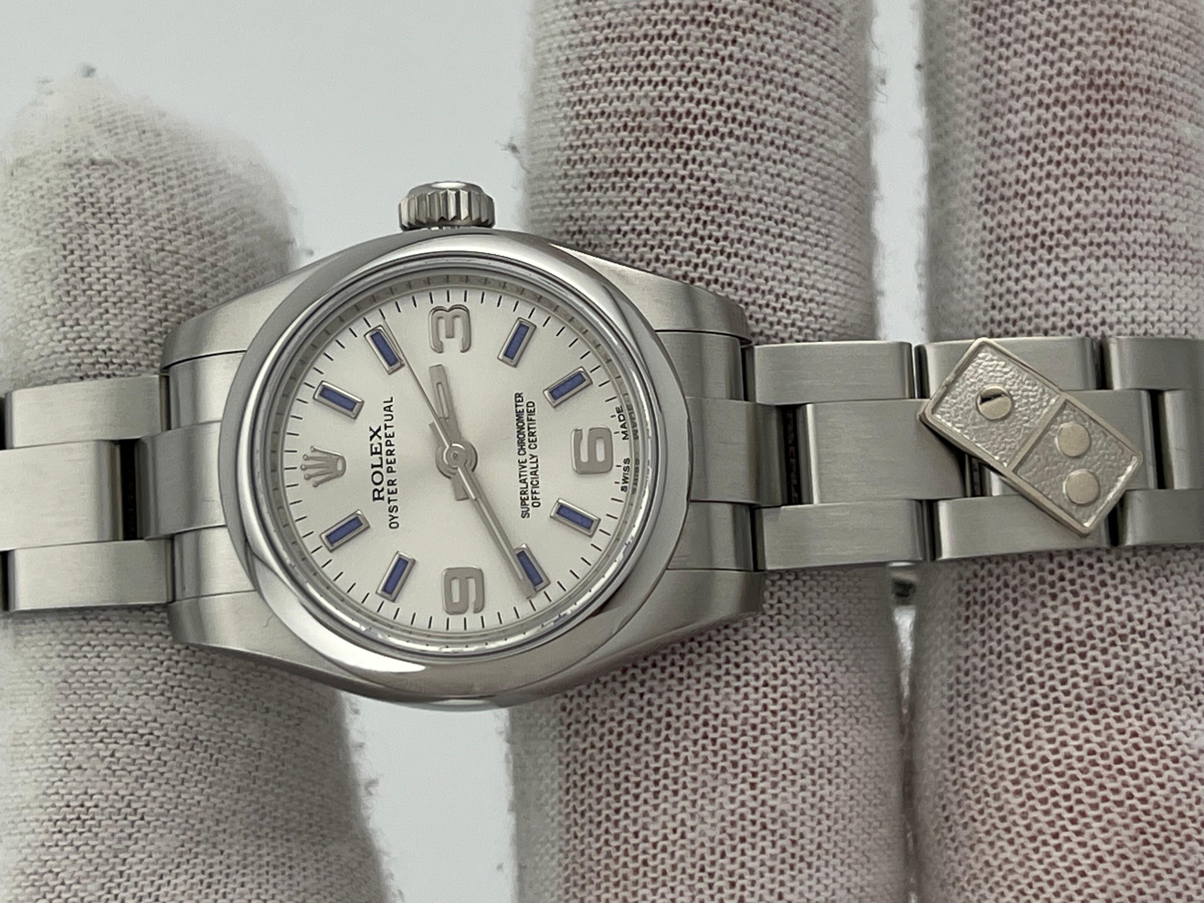 Style Number: 176200


Serial: 174U0***


Year: 2015


Model: Rolex Ladies Oyster Perpetual


Case Material: Stainless Steel


Band: Stainless Steel


Bezel: Stainless Steel


Dial: Silver with 3 Blue Arabic Numerals 


Face: Sapphire Crystal

Case