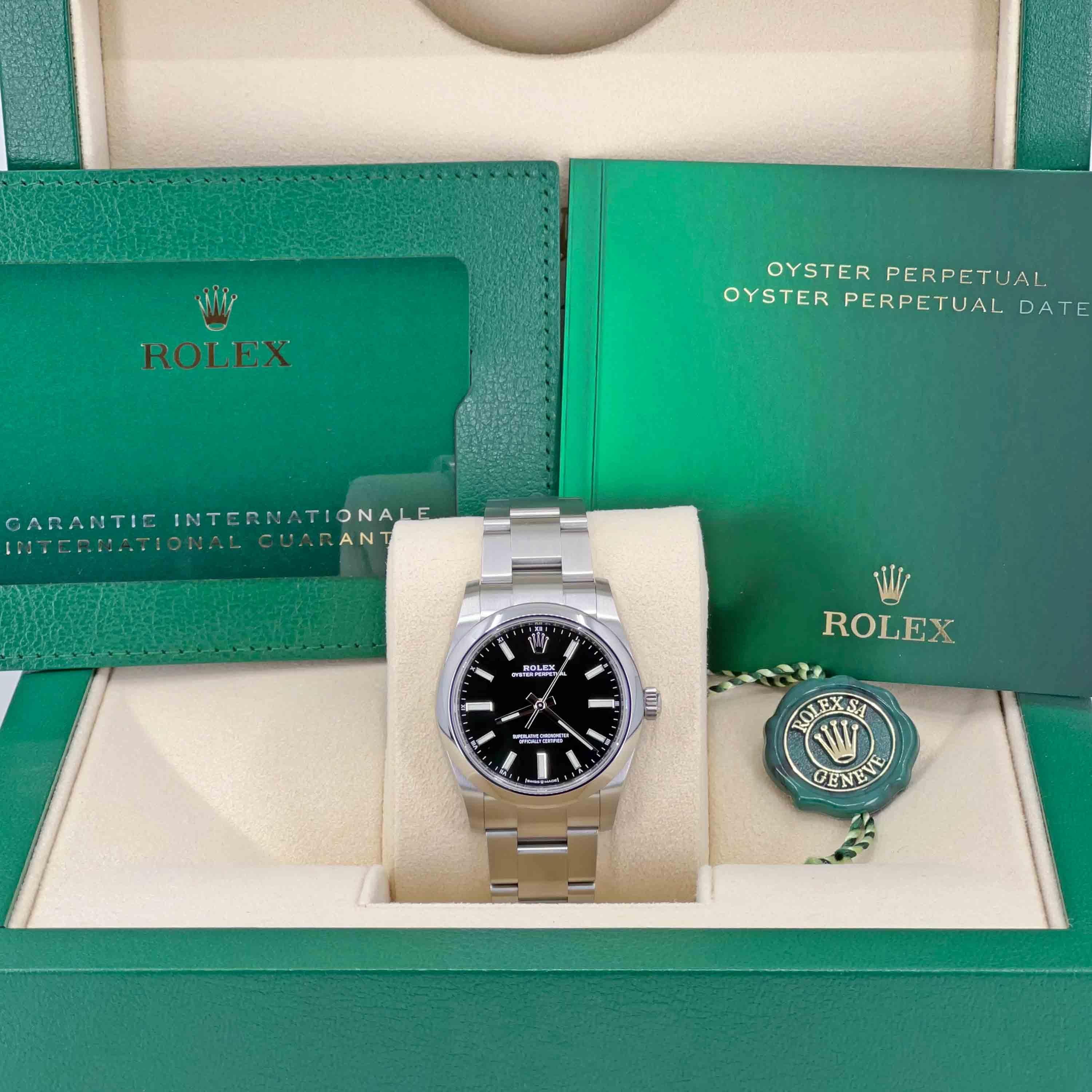 ATTENTION: This is a 34 mm watch that will be perfect for a lady's wrist and too small for the majority of men's wrists.
Please try this size with your local Rolex AD before placing the order.

34mm Oystersteel case, screw-down crown with twinlock