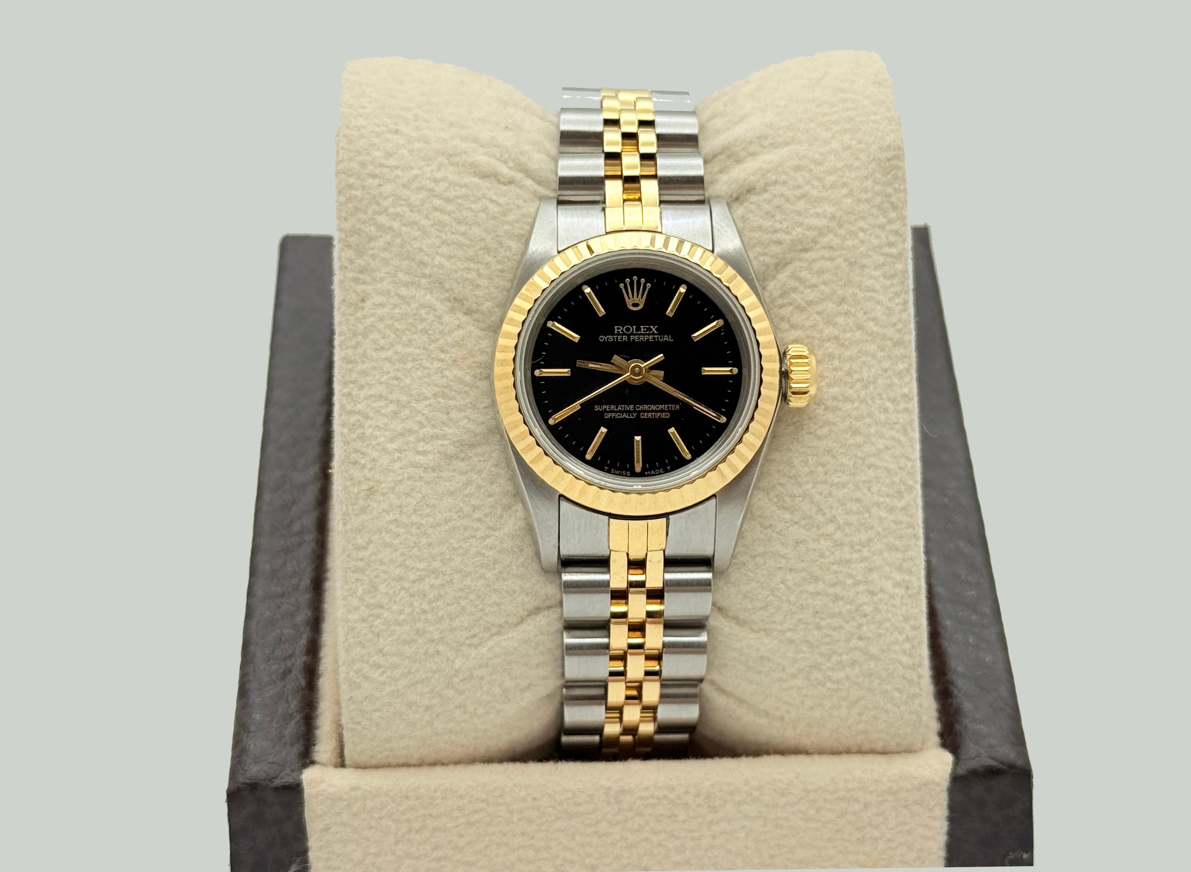 
Style Number: 67193



Serial: E62****



Year: 1992

 

Model: Rolex Ladies Oyster Perpetual

 

Case Material: Stainless Steel

 

Band: 18k Yellow Gold & Stainless Steel

  

Bezel: !8k Yellow Gold

  

Dial: Black Dial

 

Crystal: Sapphire