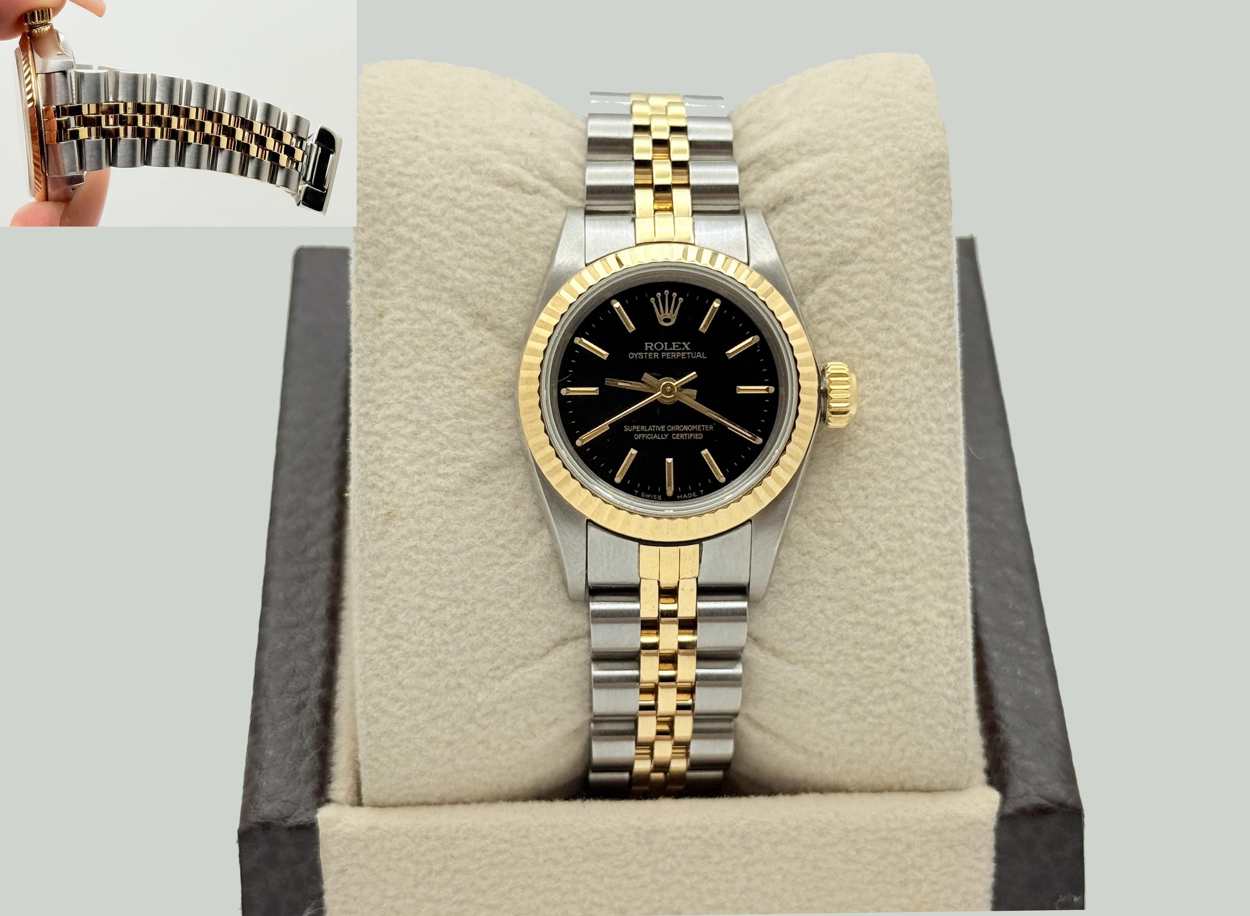 Rolex Ladies Oyster Perpetual 67193 Black Dial 18K Yellow Gold Steel Box Papers In Excellent Condition For Sale In San Diego, CA