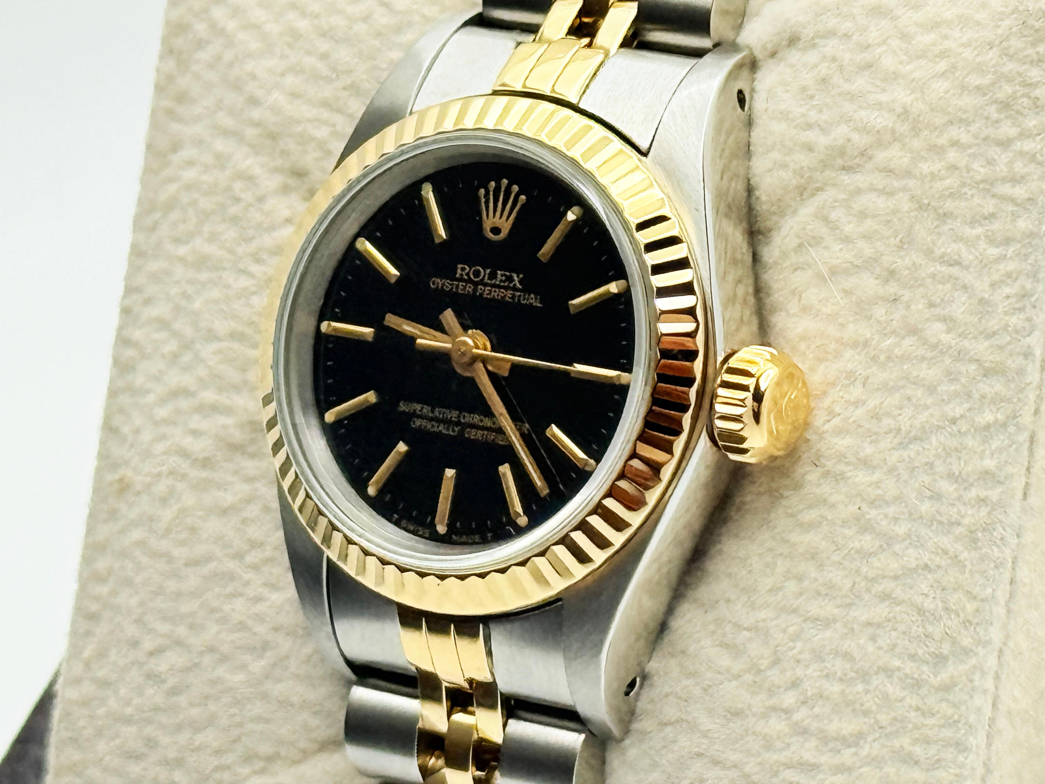Rolex Ladies Oyster Perpetual 67193 Black Dial 18K Yellow Gold Steel Box Papers For Sale 1