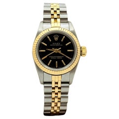 Rolex Damen Oyster Perpetual 67193 Schwarzes Zifferblatt 18K Gelbgold Stahl Box Papiere