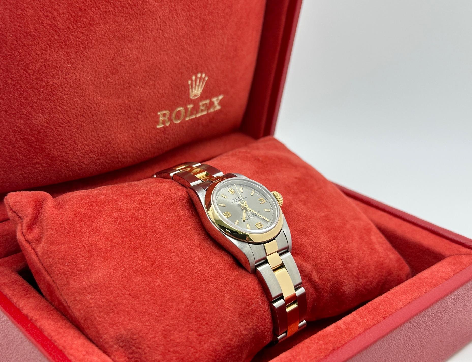Rolex Damen Oyster Perpetual 67243 Stahl arabisches Zifferblatt 18K Gold Stahl Box Papier im Angebot 1