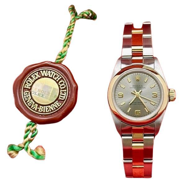 Rolex Damen Oyster Perpetual 67243 Stahl arabisches Zifferblatt 18K Gold Stahl Box Papier im Angebot