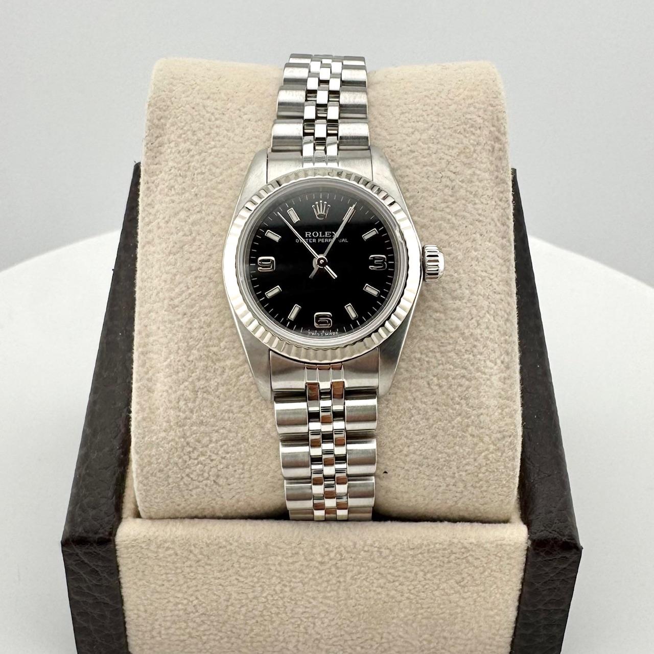 Style Number: 76094
Serial: P848***
Year: 2000
Model: Rolex Ladies Oyster Perpetual
Case Material: Stainless Steel
Band: Stainless Steel Jubilee Band
Bezel: 18K White Gold
Dial: Black Dial
Face: Sapphire Crystal
Case Size: 24mm
 
Includes: