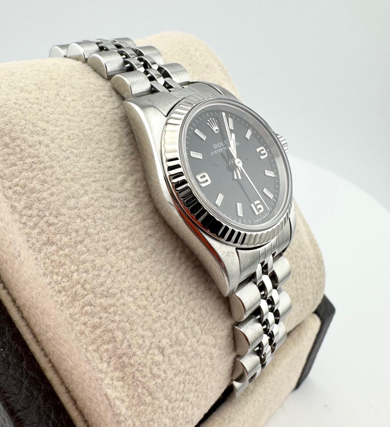 Rolex Ladies Oyster Perpetual 76094 Black Dial Stainless Steel Jubilee In Excellent Condition For Sale In San Diego, CA