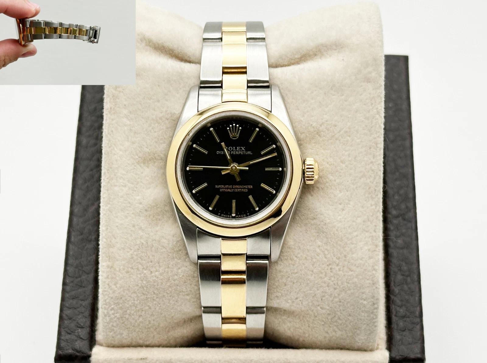 Style Number: 76183



Serial: K148***



Year: 2001

 

Model: Rolex Ladies Oyster Perpetual 

 

Case Material: Stainless Steel 

 

Band: 18K Yellow Gold & Stainless Steel Oyster Band 

  

Bezel: 18K Yellow Gold Smooth Bezel 

  

Dial: Black 

