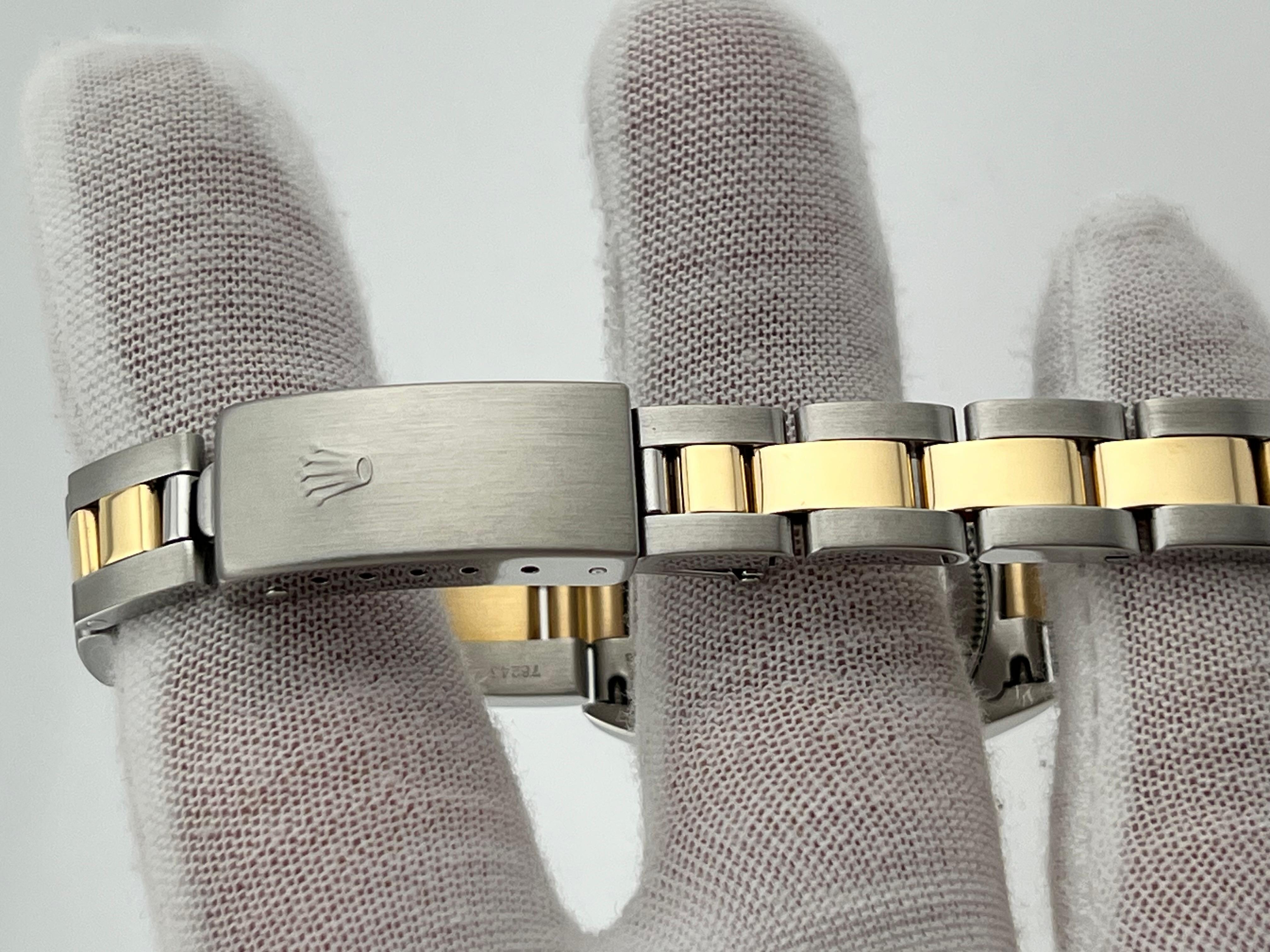 Rolex Damen Oyster Perpetual 76193 Silber Zifferblatt 18K Gelbgold Stahl Box Papier 8