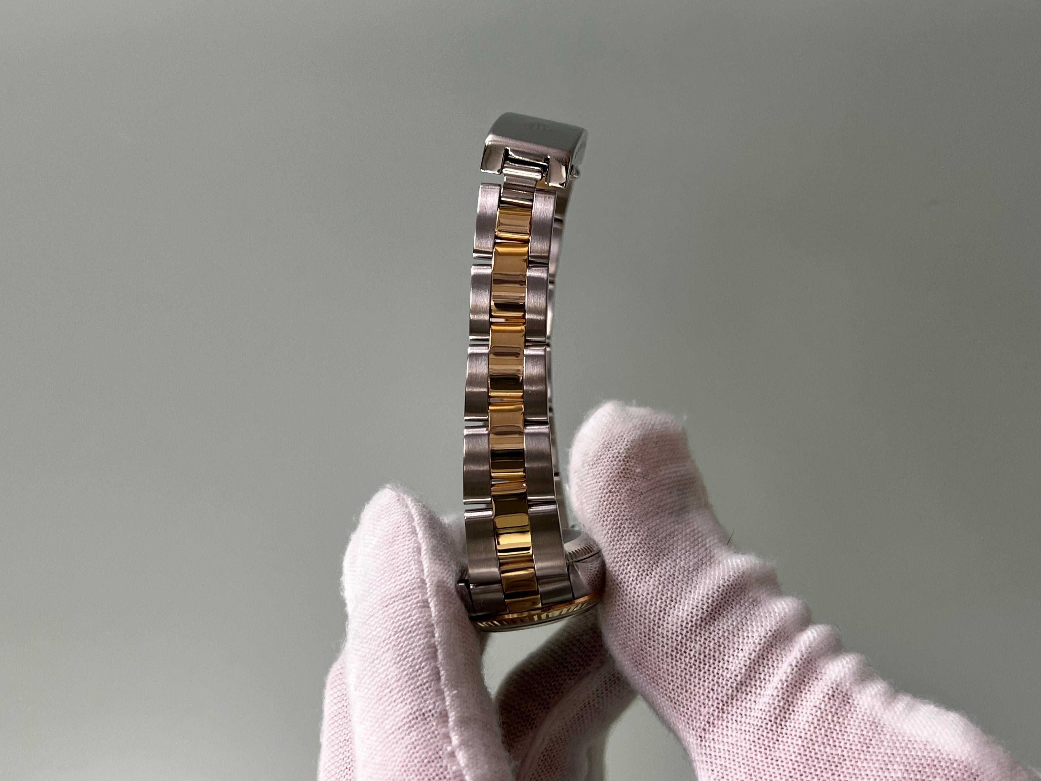 Rolex Damen Oyster Perpetual 76193 Silber Zifferblatt 18K Gelbgold Stahl Box Papier 11