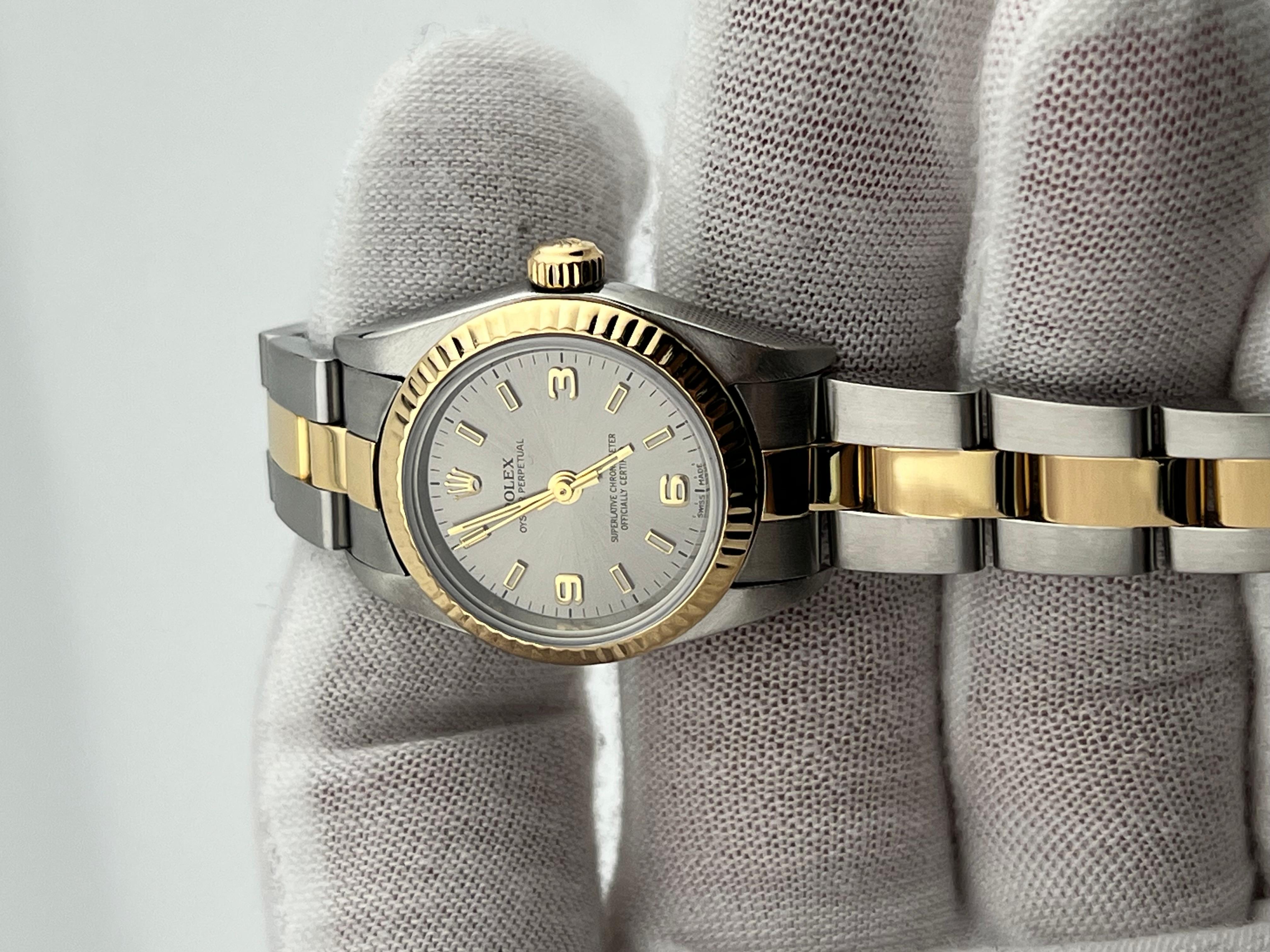 Rolex Damen Oyster Perpetual 76193 Silber Zifferblatt 18K Gelbgold Stahl Box Papier 2