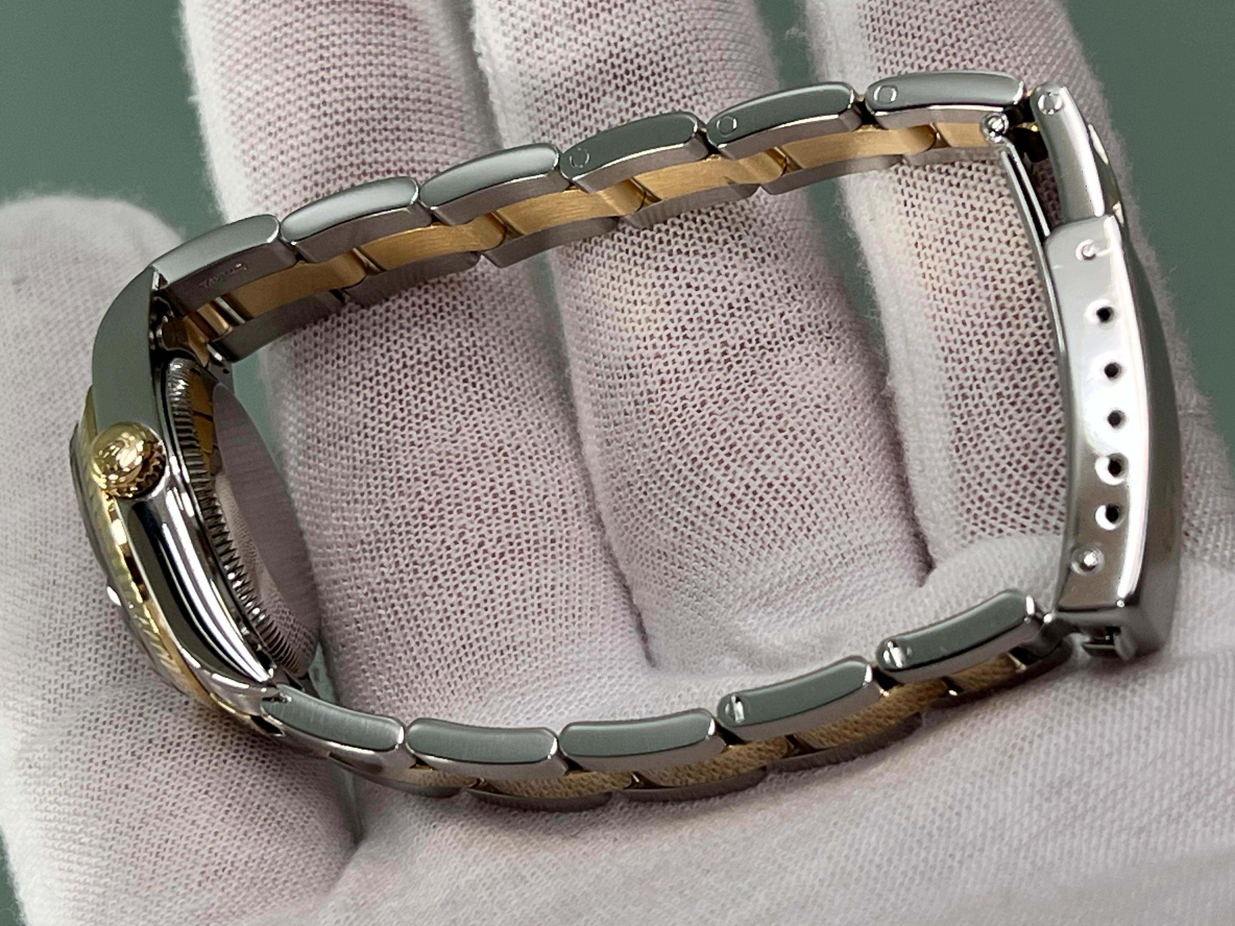 Rolex Damen Oyster Perpetual 76193 Silber Zifferblatt 18K Gelbgold Stahl Box Papier 4