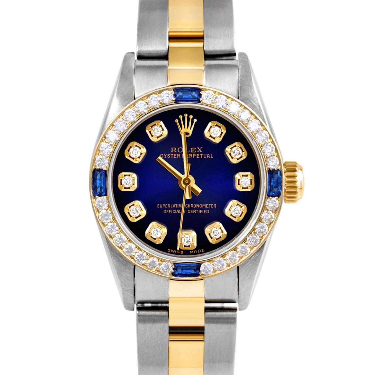 Brand : Rolex
Model : Oyster Perpetual 
Gender : Ladies
Metals : 14K Yellow Gold / Stainless Steel
Case Size : 24 mm

Dial : Custom Blue Vignette Diamond Dial (This dial is not original Rolex And has been added aftermarket yet is a beautiful Custom