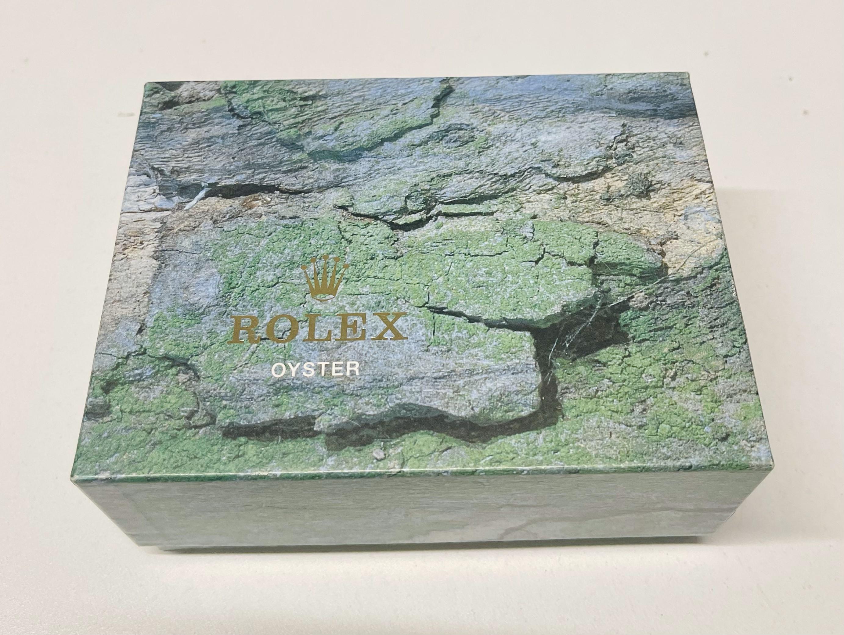 Rolex Damen Oyster Perpetual Armbanduhr aus massivem Gelbgold mit Saphirblauem Zifferblatt im Angebot 6