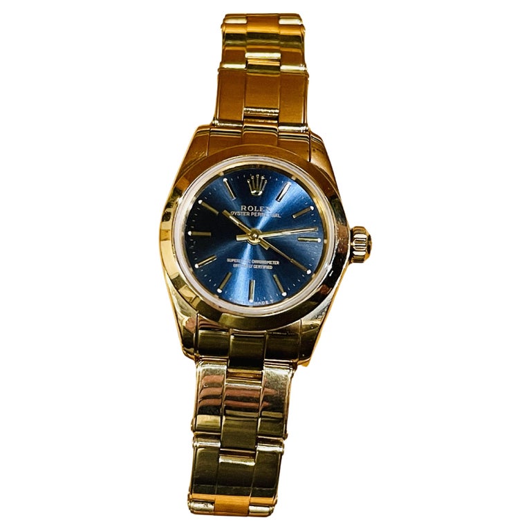 Rolex Ladies Oyster Perpetual Solid Yellow Gold Watch with Sapphire Blue  Dial For Sale at 1stDibs | gold watch blue face women's, gold watch with  blue face women's, rolex oyster perpetual oro