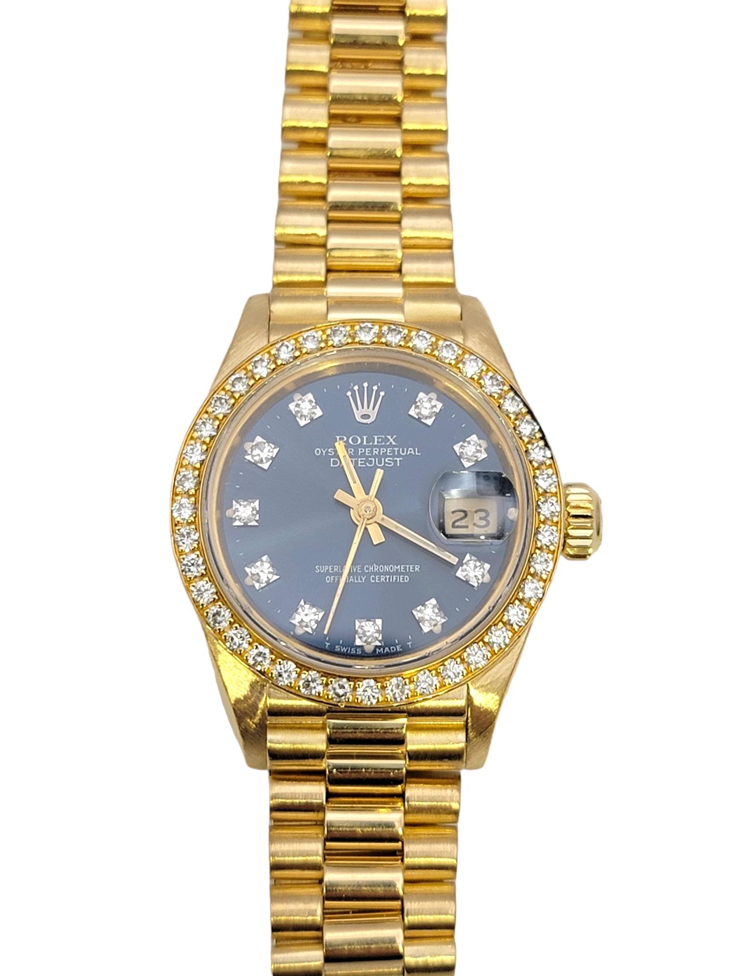 Incredible ladies Rolex datejust perpetual wristwatch. This stunning, high quality designer timepiece is embellished with shimmering natural diamonds and is made of 18 karat yellow gold. This beautiful, feminine piece looks elegant and sophisticated