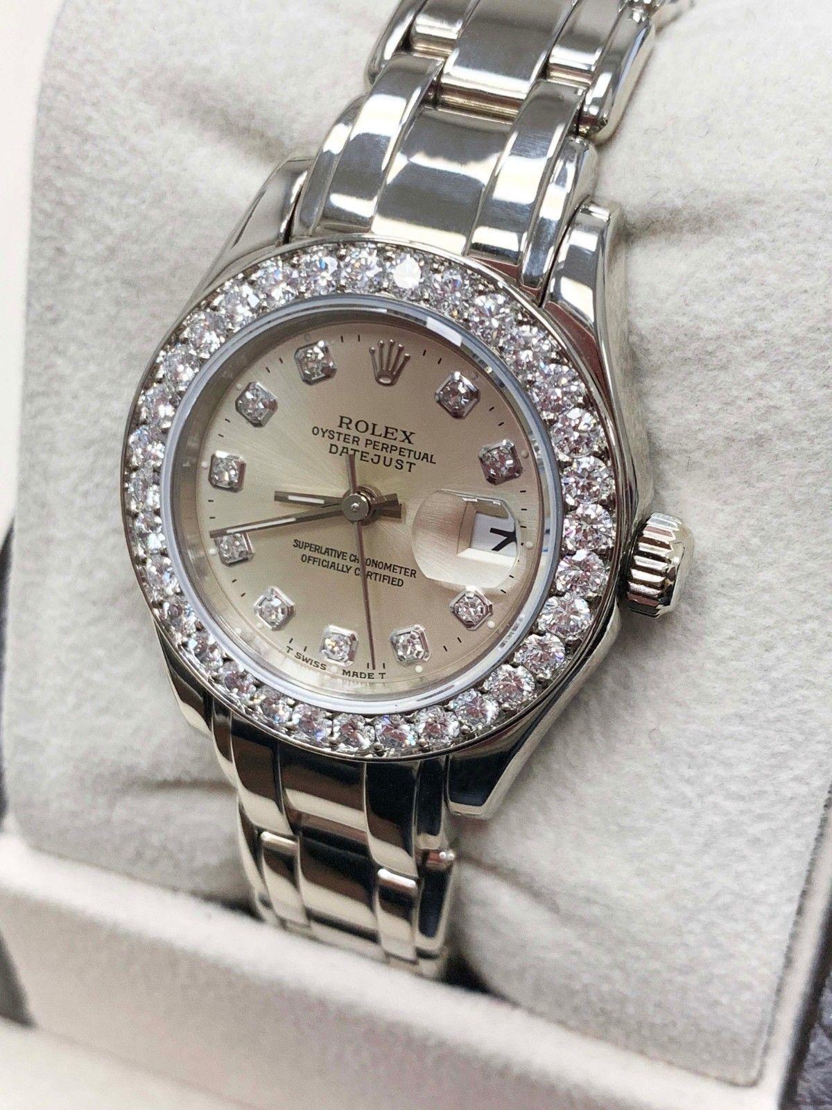 Style Number: 69299 

Serial: N587***

Model: Pearlmaster

Case: 18K White Gold

Band: 18K White Gold

Bezel: Original Factory Diamond Bezel

Dial: Original Silver Factory Diamond Dial 

Face: Sapphire Crystal 

Case Size: 29mm

Includes: 

-Elegant