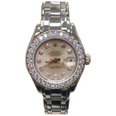 Rolex Montre Pearlmaster 69299 pour femme avec cadran et lunette d'origine en or 18 carats et diamants