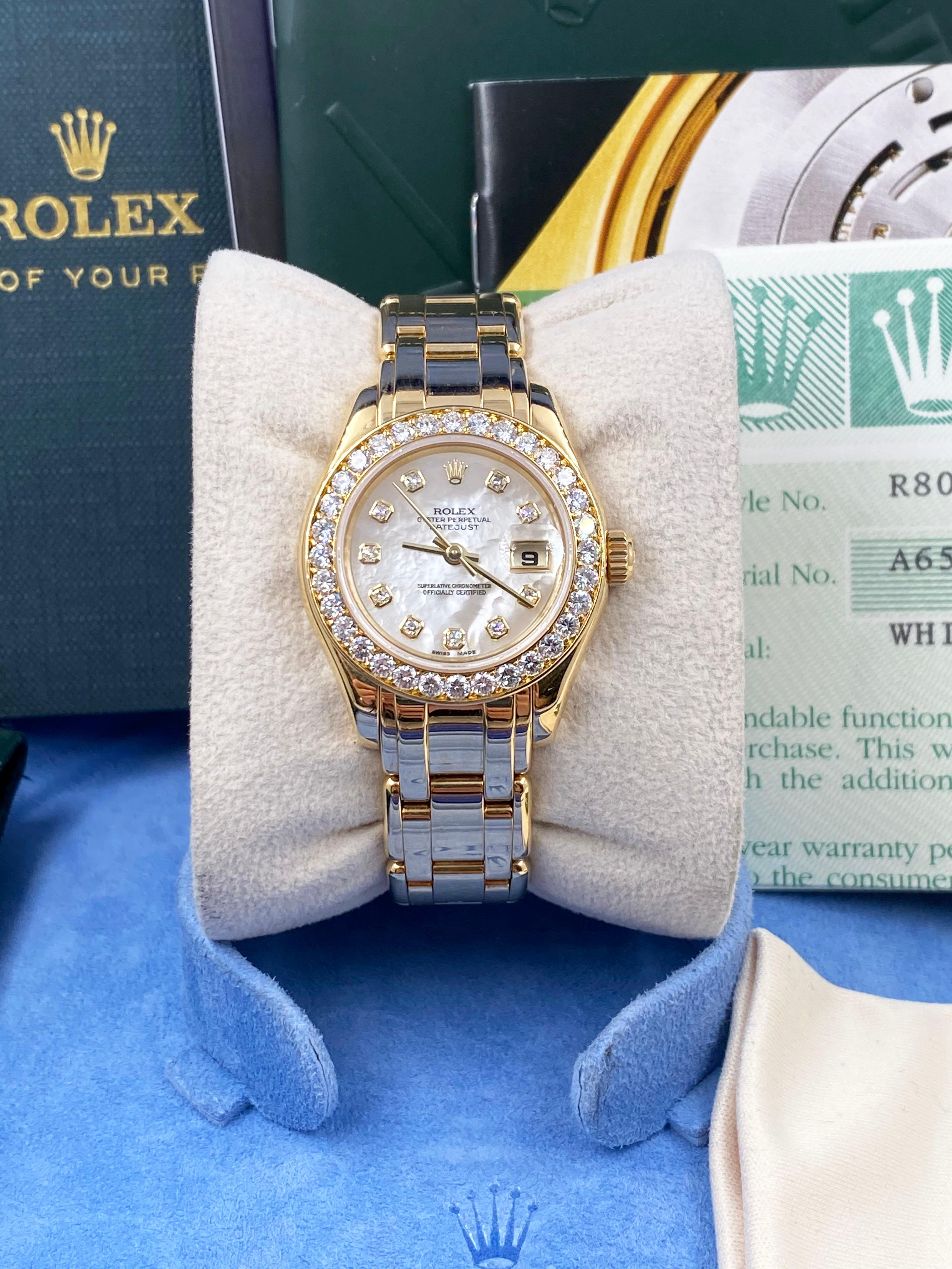 Style Number: 80298
 
Serial: A657***

Year: 2000
 
Model: Pearlmaster
 
Case Material: 18K Yellow Gold
 
Band: 18K Yellow Gold
 
Bezel: Original Factory Diamond Bezel
 
Dial: Original Factory Mother of Pearl Diamond Dial 
 
Face: Sapphire Crystal 
